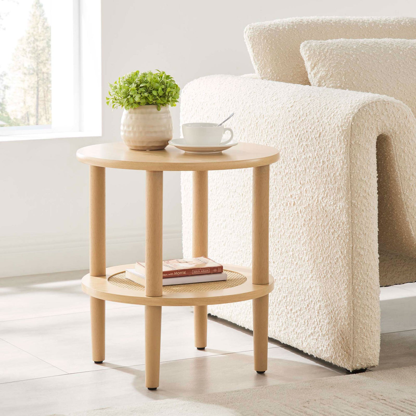 Oak side table with rattan shelf styled beside a cozy sofa for drinks, books, and decor || EEI-6527-OAK || front_angle_room