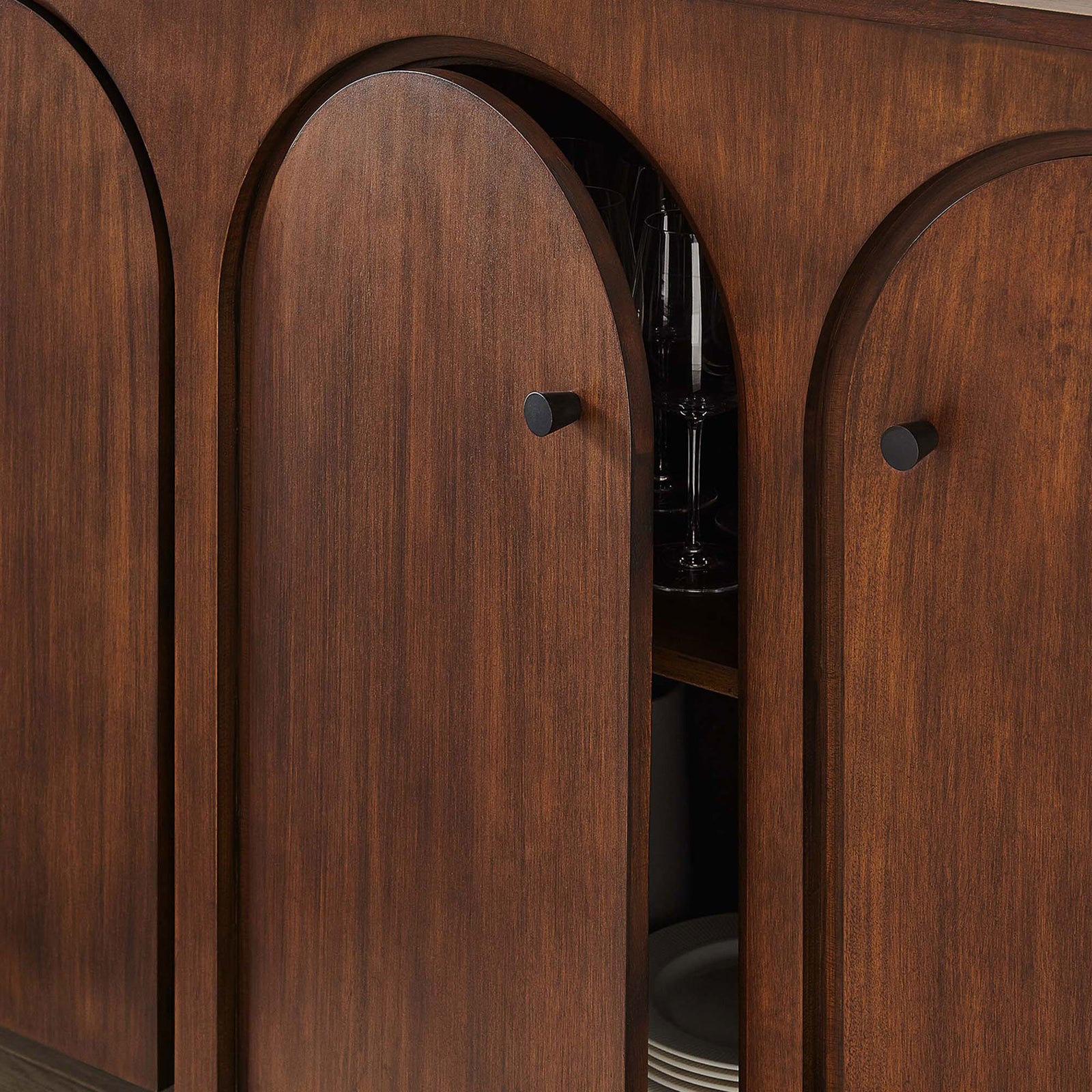 Walnut sideboard doors reveal neatly organized dishes and glassware on adjustable shelves || EEI-6538-WAL || storage_open_room