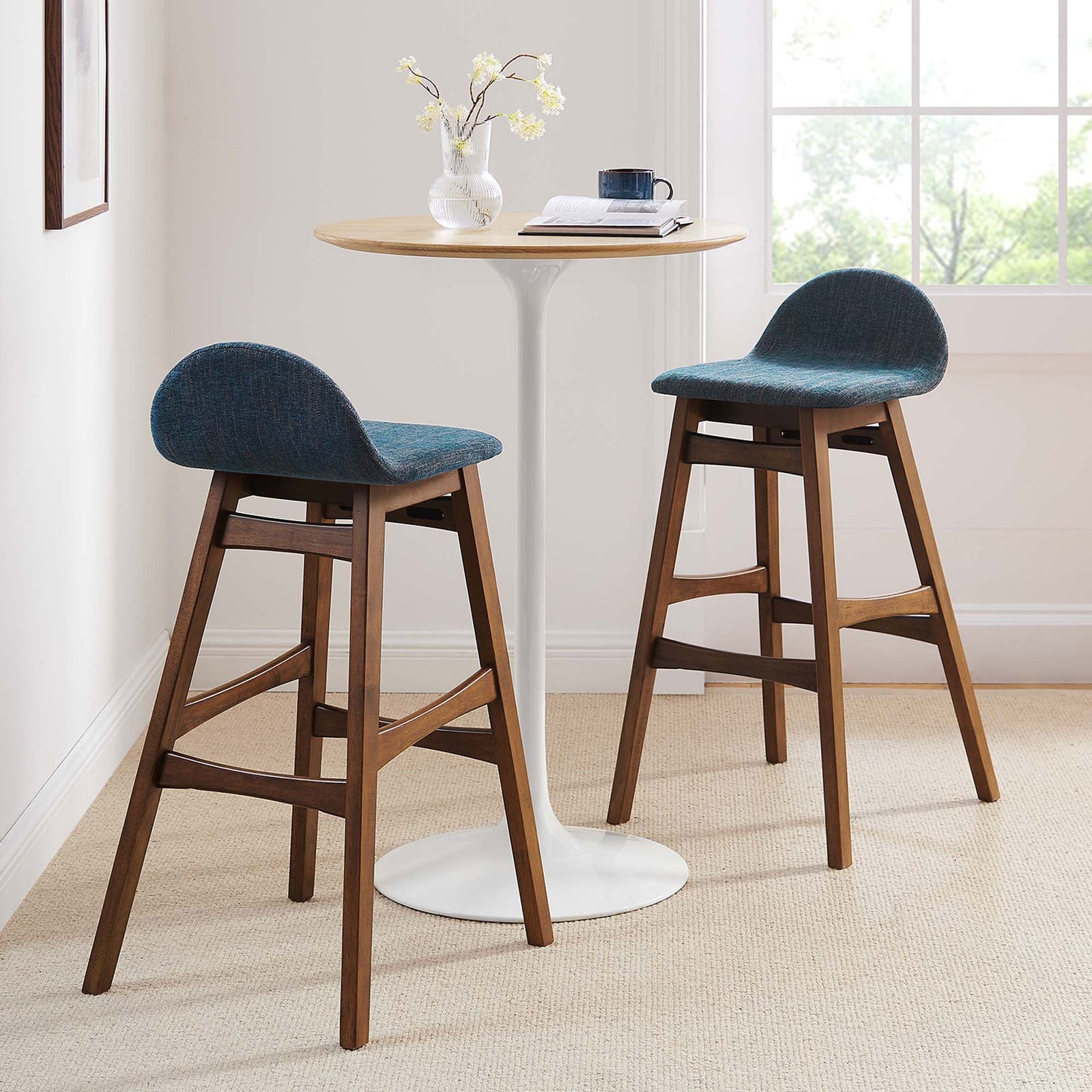 A coordinated pair elevates casual gatherings with supportive seats and warm wood. || EEI-6553-HEA || front_angle_multi_room