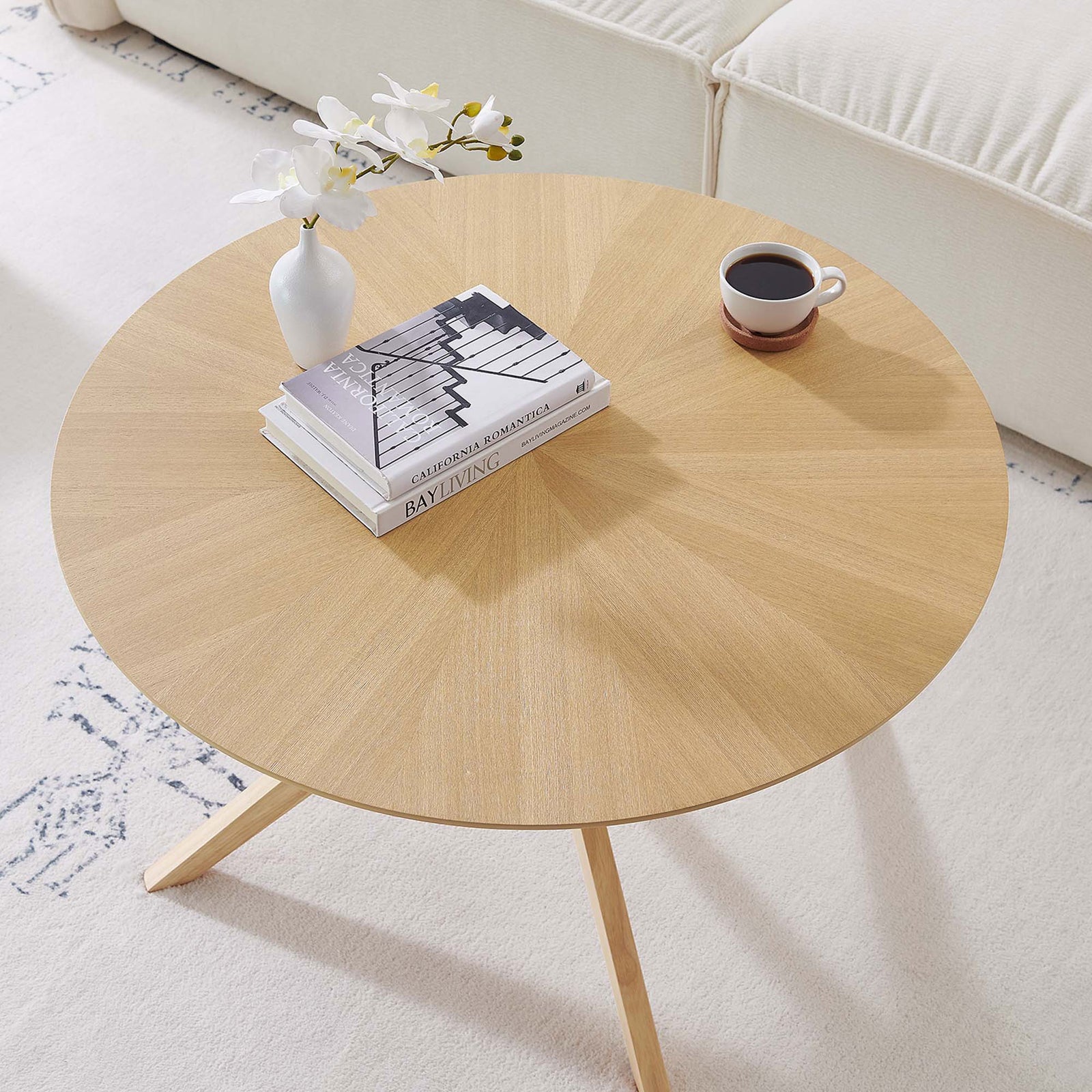 Oak round top brings warmth and pattern, styled for effortless everyday use in the living room || EEI-6557-OAK || top_angle_room
