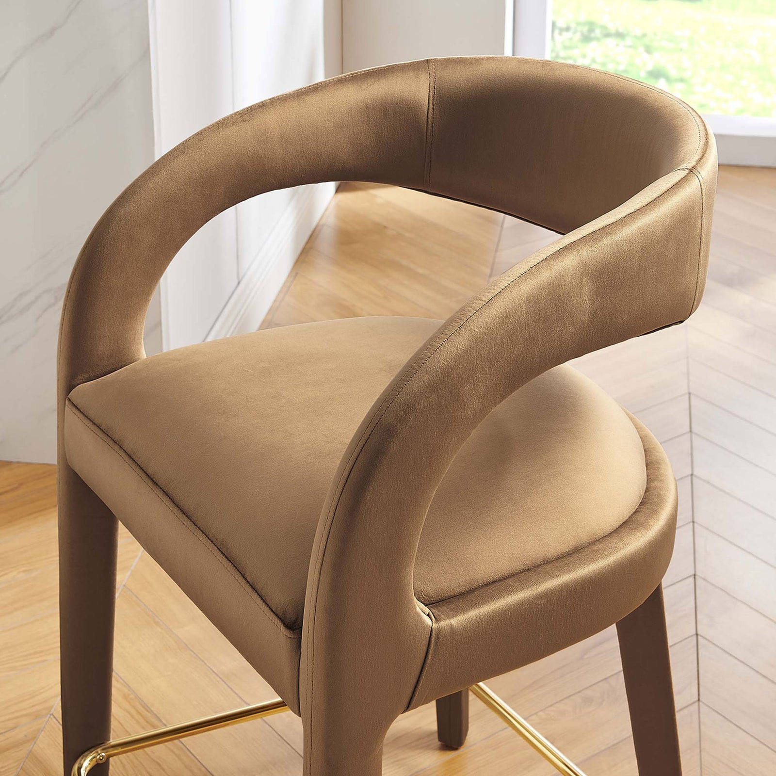 Warm brown velvet and sculpted backrest elevate the look with a chic gold footrest || EEI-6566-BRN-GLD || detail_room