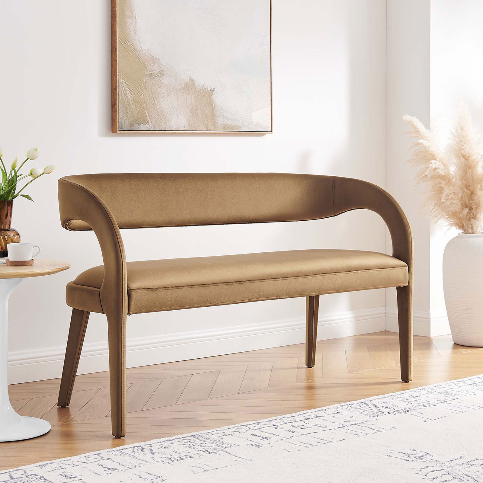 Modern accent bench brings luxe warmth to the living room with its open-back curve and plush seat. || EEI-6572-BRN || front_angle_room