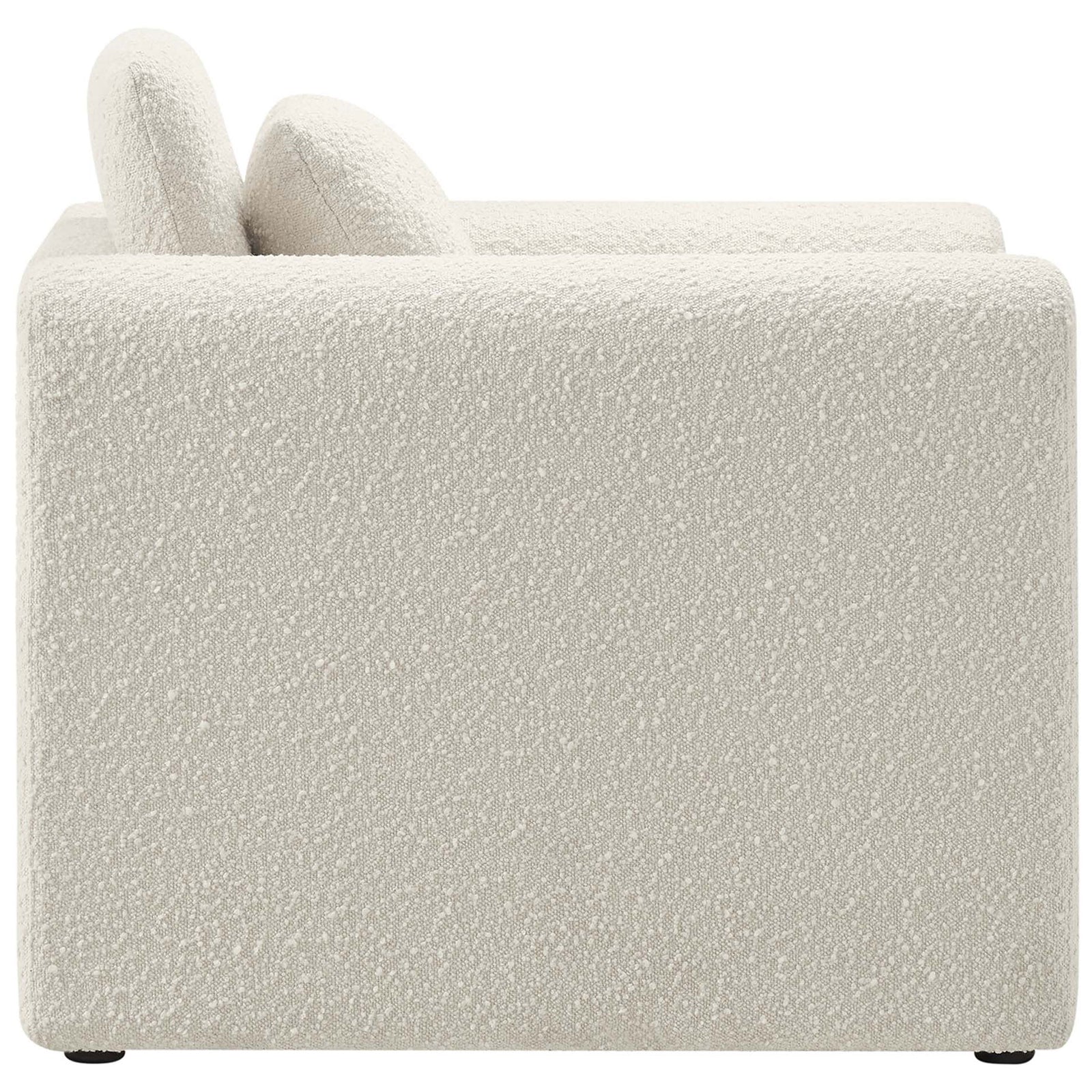 Sculptural bent-arm design wrapped in soft, nubby boucle for modern lounge appeal. || EEI-6575-IVO || side_studio
