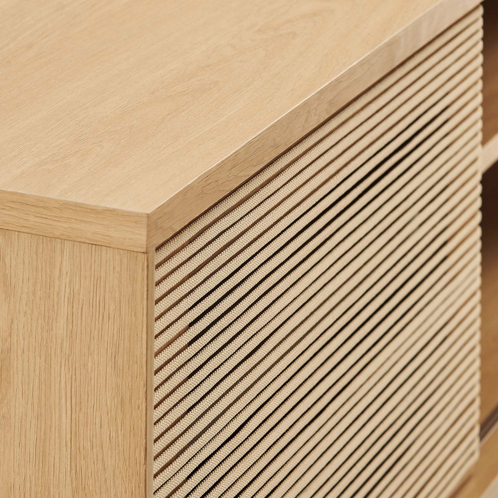 Milo TV stand highlighting the woven rope door texture beside warm oak tan wood grain || EEI-6584-OAK-TAN || swatch_studio