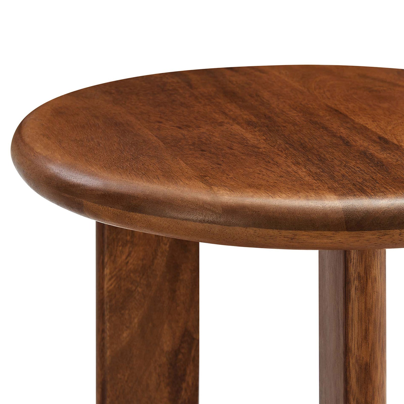 Rounded tabletop edge highlights the smooth mango wood surface and rich walnut stain || EEI-6595-WAL || detail_studio