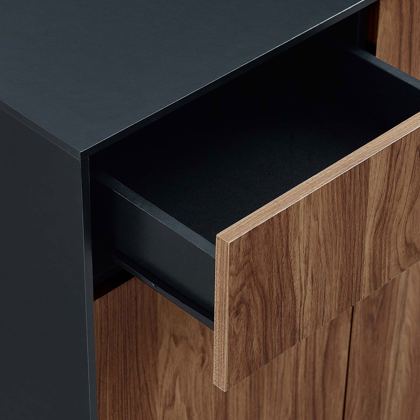 Open drawer of the Holden sideboard highlighting smooth wood grain front and spacious black interior || EEI-6597-BLK-WAL || storage_open_studio