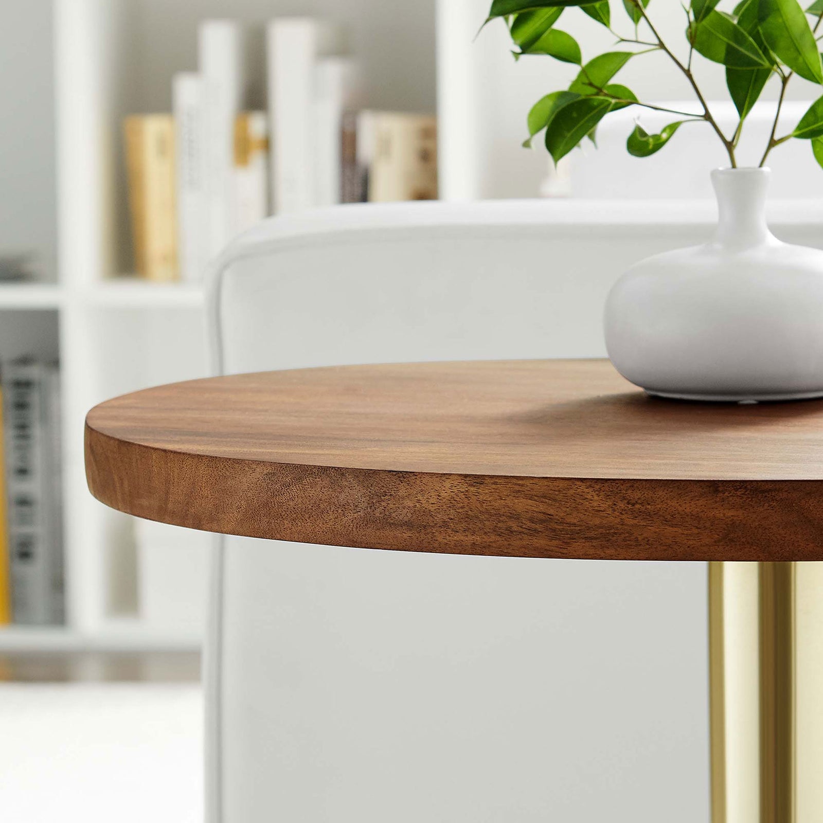 Acacia wood tabletop beside a white sofa, styled with a simple vase in a bright modern living room || EEI-6610-BRA-LOC || detail_room