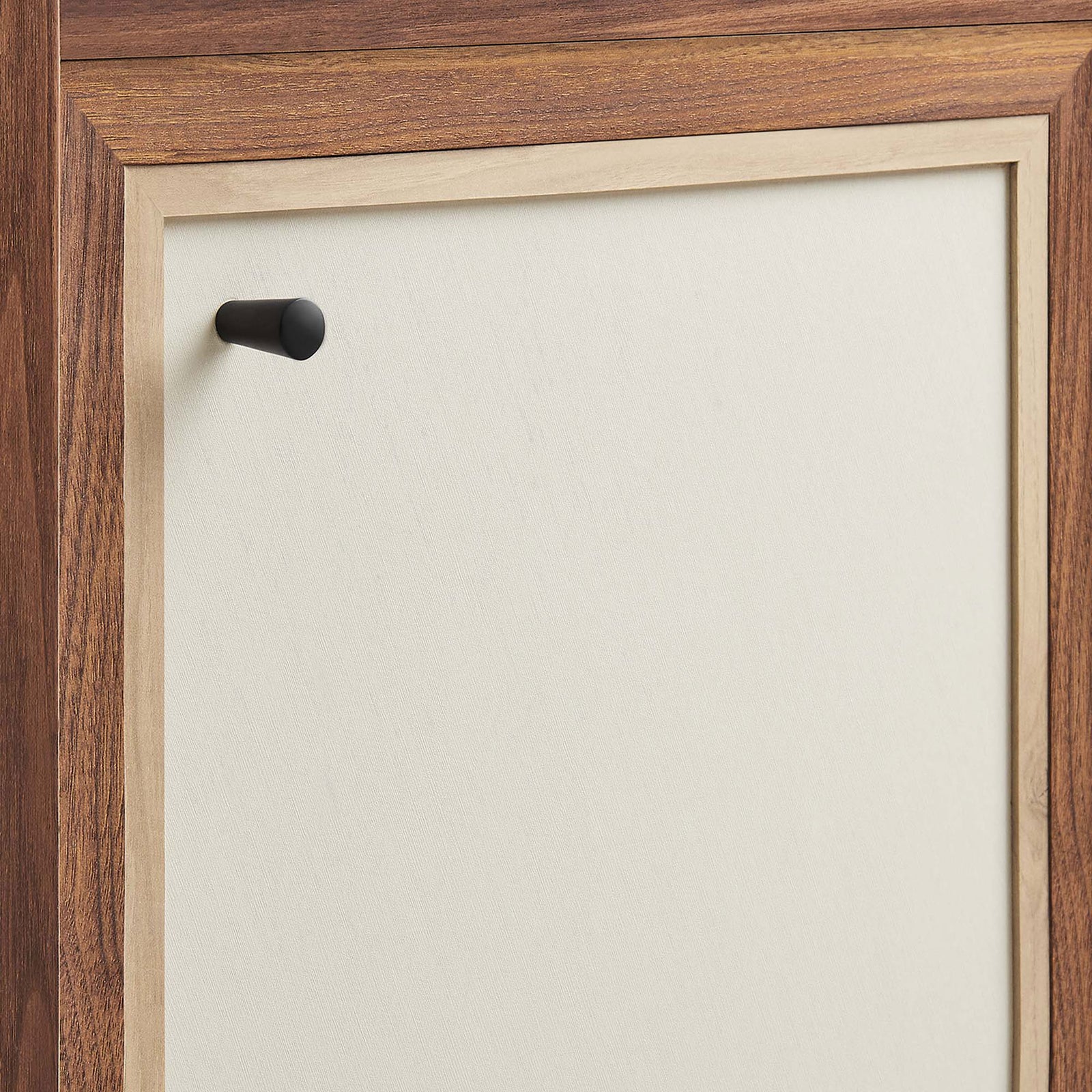 Linen-textured door panel with a minimalist black knob and warm walnut trim. || EEI-6617-WAL || handle_studio