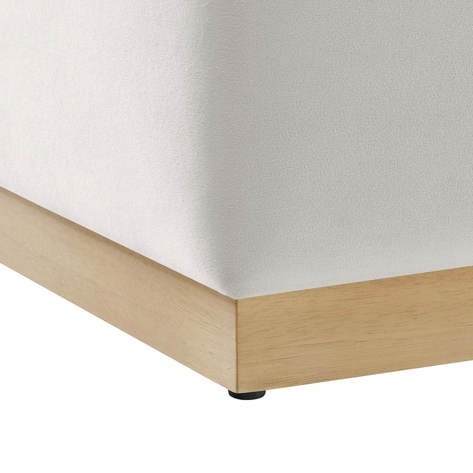 Light rubberwood plinth base and non-marking glides support the plush alabaster velvet ottoman. || EEI-6640-ALA-NAT || leg_studio
