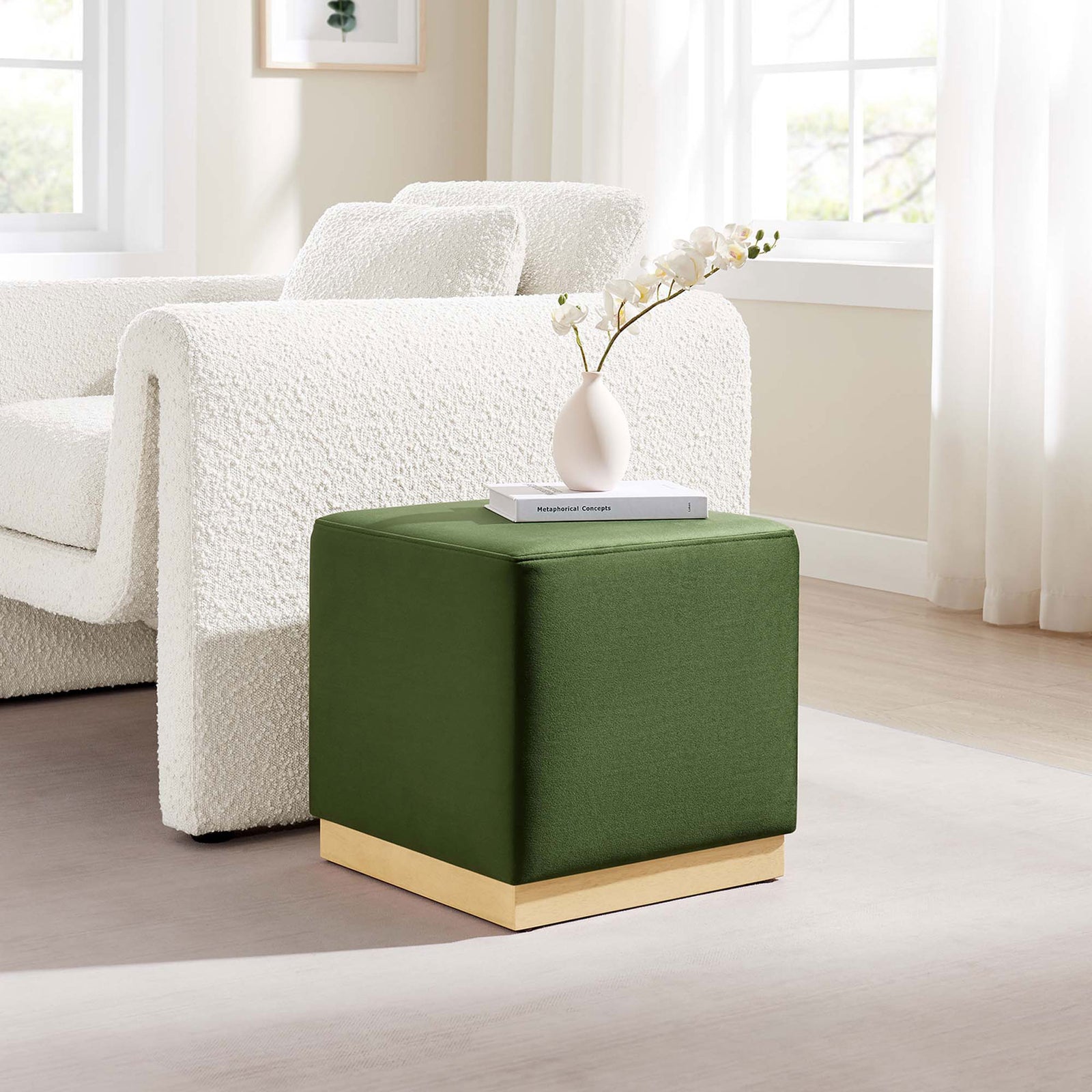Moss green cube ottoman used as a chic side table in a bright living room || EEI-6640-MOG-NAT || front_angle_room