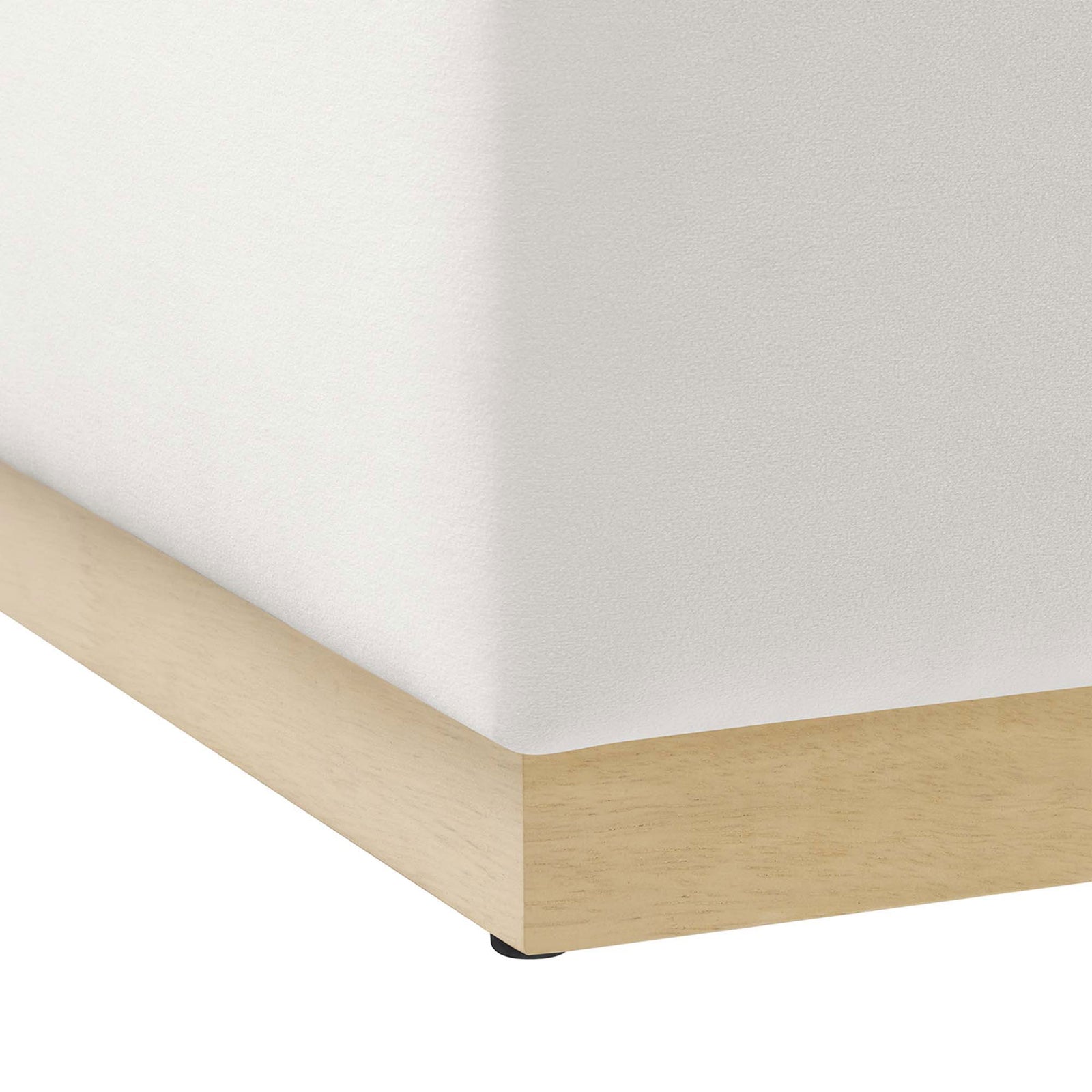 Close view of the tailored corner detailing and light wood plinth base with subtle rounded edge || EEI-6643-ALA-NAT || leg_studio