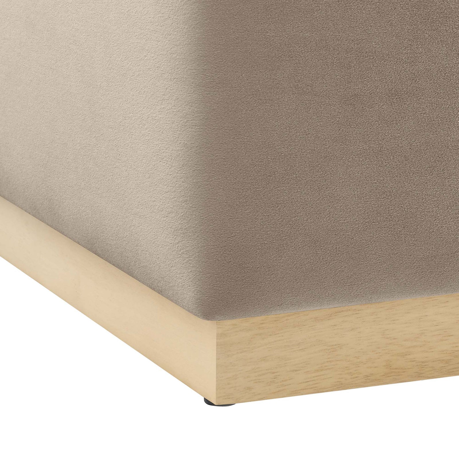 Detail of taupe velvet upholstery meeting the natural wood plinth base with protective floor glides || EEI-6643-TAU-NAT || leg_studio