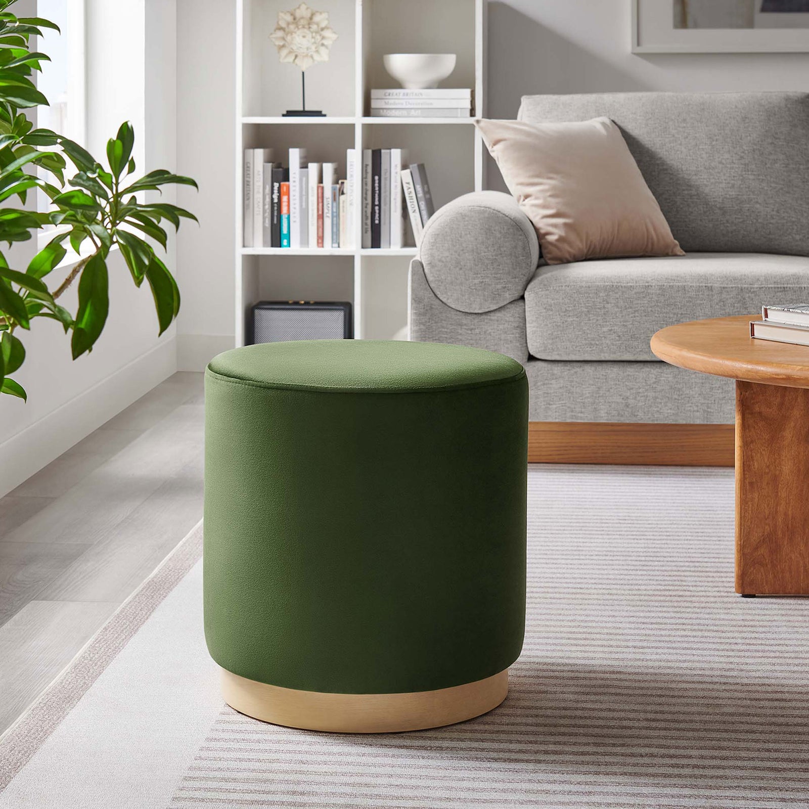 Moss green round ottoman adds modern color and extra seating to a bright living room setup || EEI-6652-MOG-NAT || front_angle_room