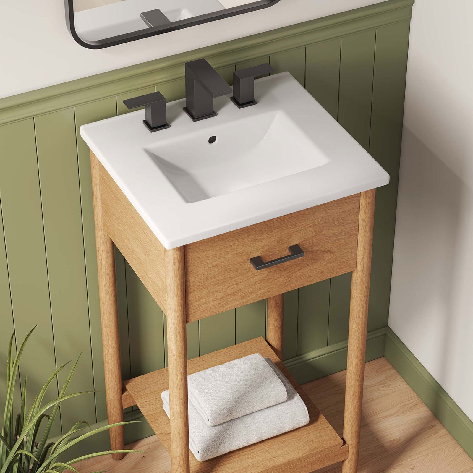 White basin and black hardware contrast beautifully with the warm wood finish and open shelf. || EEI-6658-NAT-WHI || detail_room