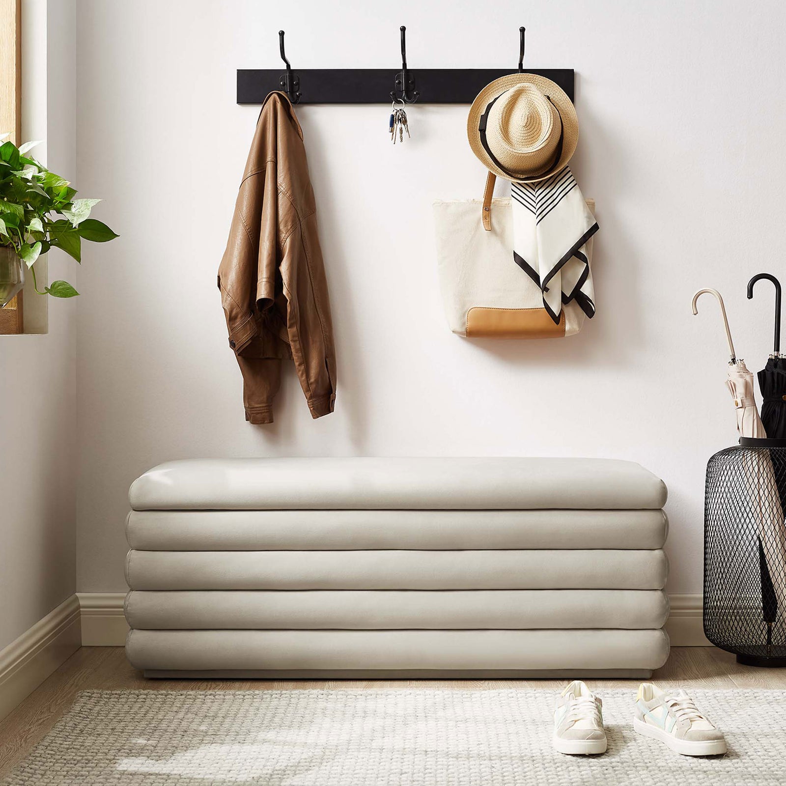 Versatile almond bench adds cushioned seating and subtle texture to the entryway. || EEI-6664-ALM || front_room