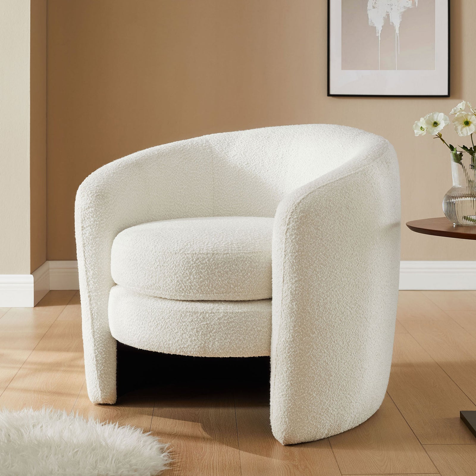 Elevates any room with its cloud boucle upholstery and graceful, embracing form || EEI-6666-CLO || front_angle_room