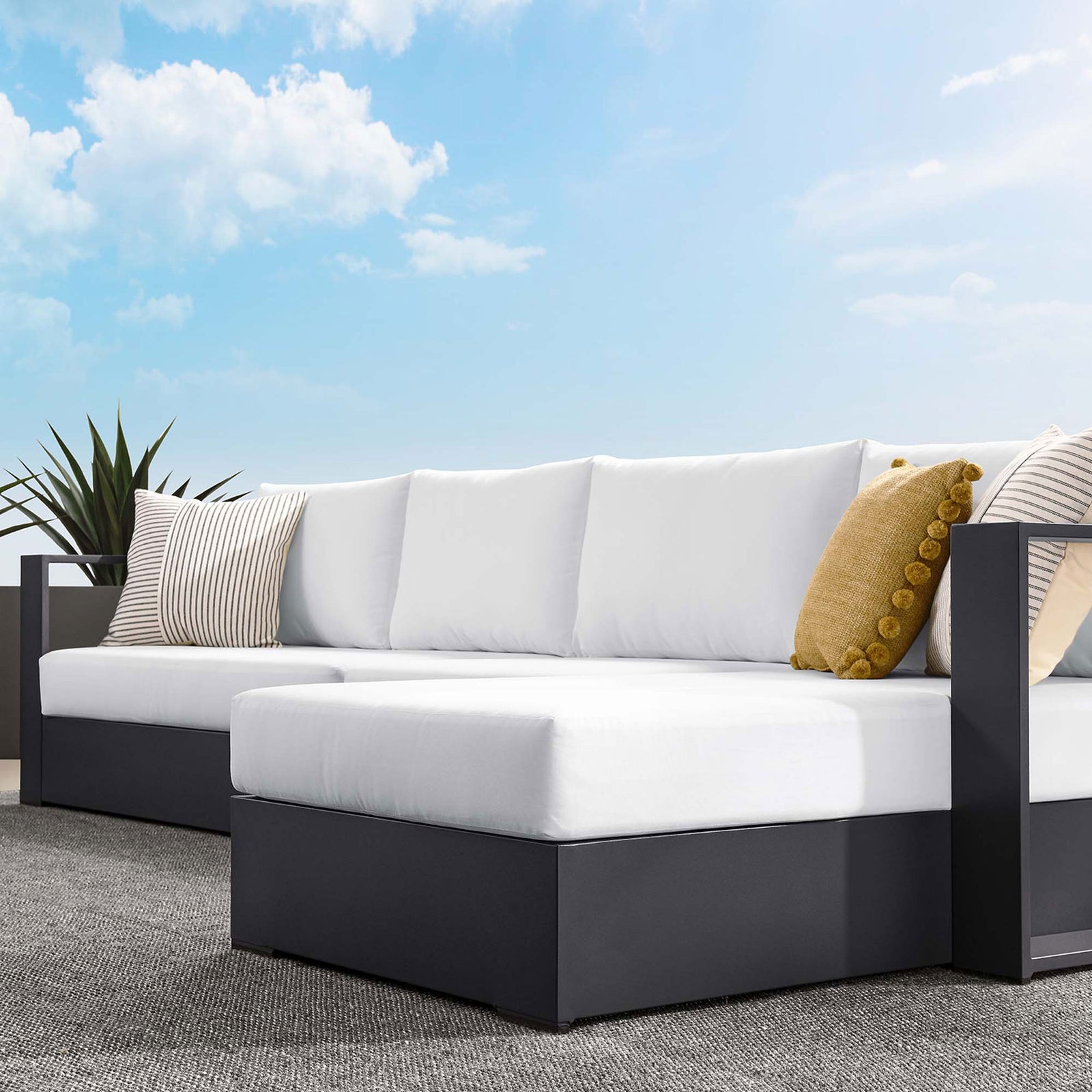 White sectional corner with layered pillows showing plush seating and relaxed coastal style || EEI-6671-GRY-WHI || detail_room