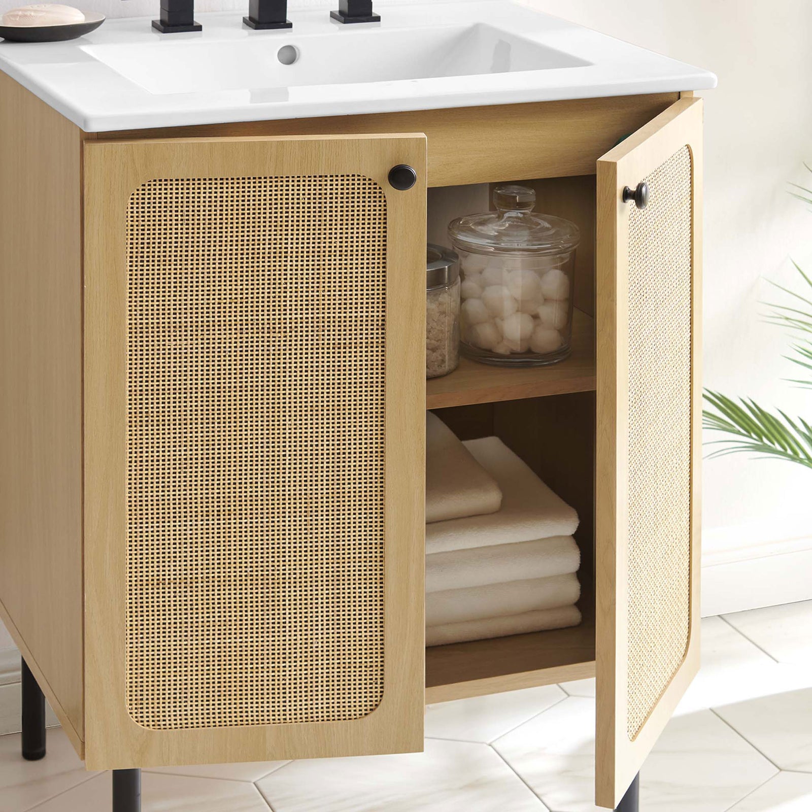 Spacious storage with adjustable shelving behind rattan doors keeps towels and toiletries tidy || EEI-6693-OAK-WHI || front_open_room