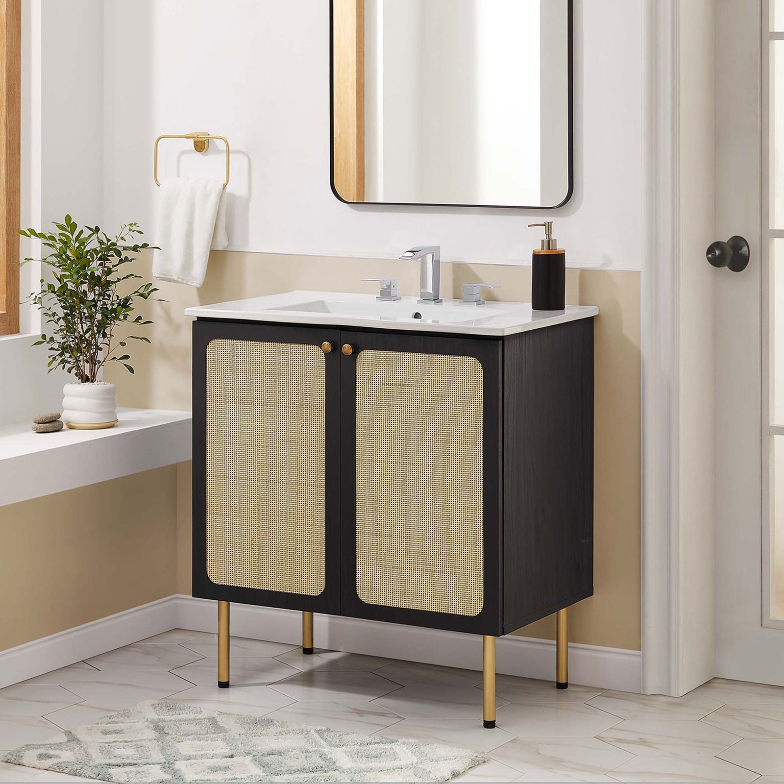 Polished vanity completes the space with warm cane texture and bright white top || EEI-6695-BLK-WHI || front_room