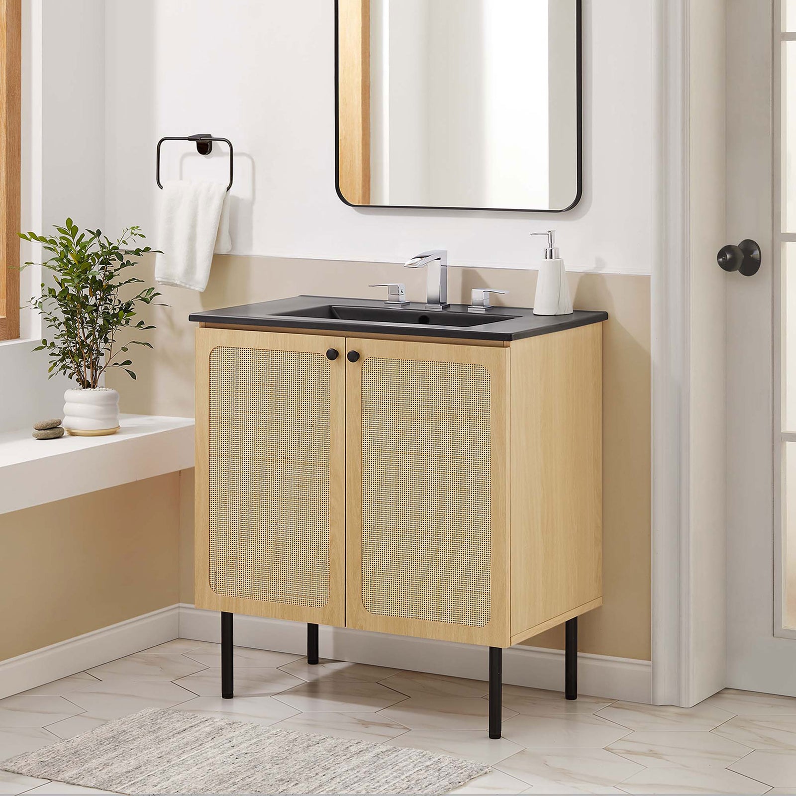 Inviting 30-inch vanity completes the bath with warmth and modern contrast. || EEI-6696-OAK-BLK || front_room