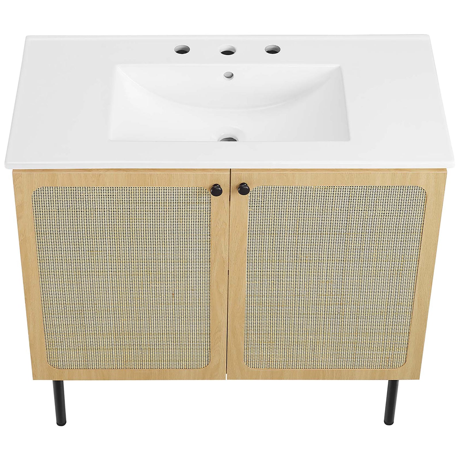 Broad ceramic counter with softly contoured basin tops the rattan-front cabinet || EEI-6697-OAK-WHI || top_angle_studio