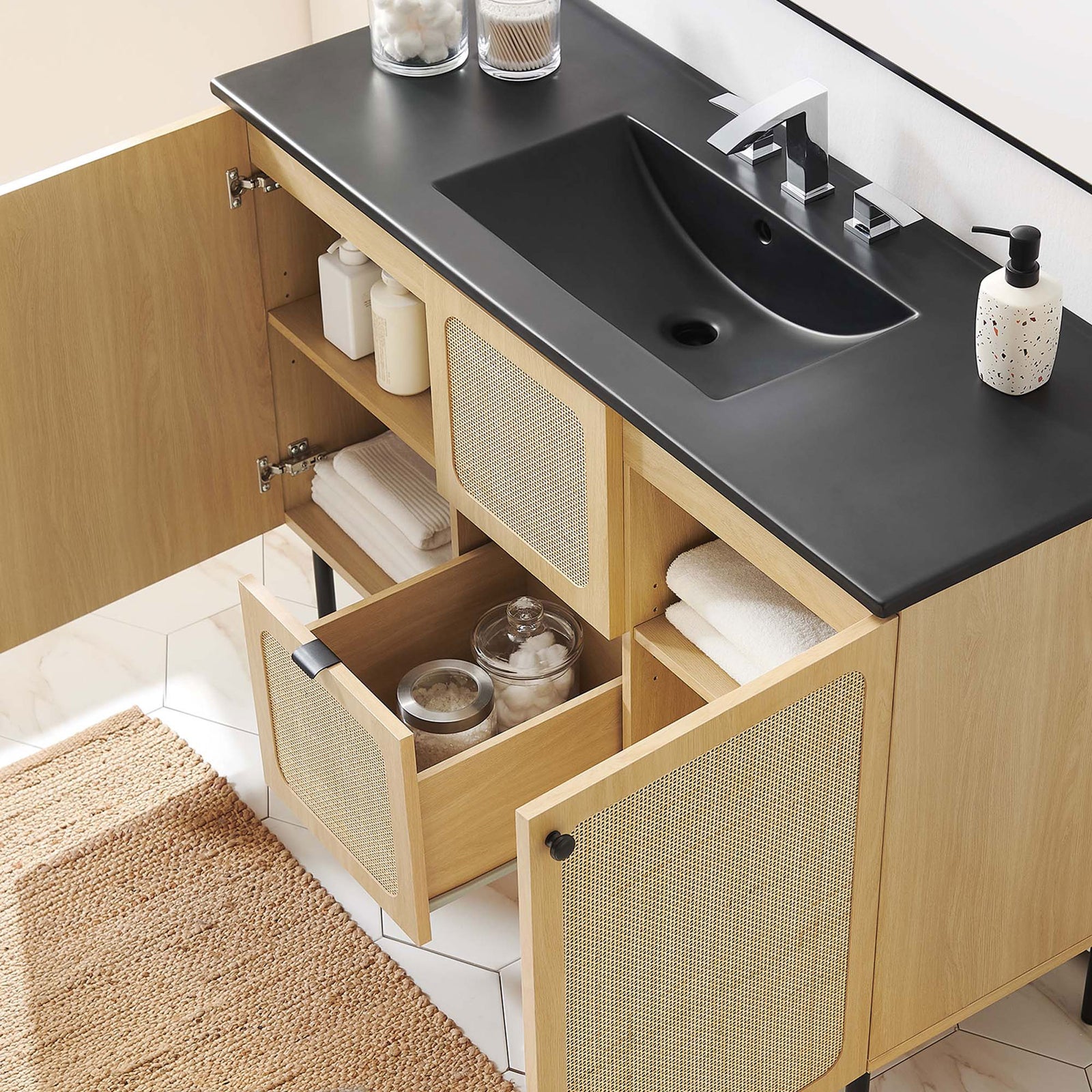 Ample storage is revealed behind the doors and drawer while the basin keeps counters clutter-free || EEI-6700-OAK-BLK || front_angle_open_room