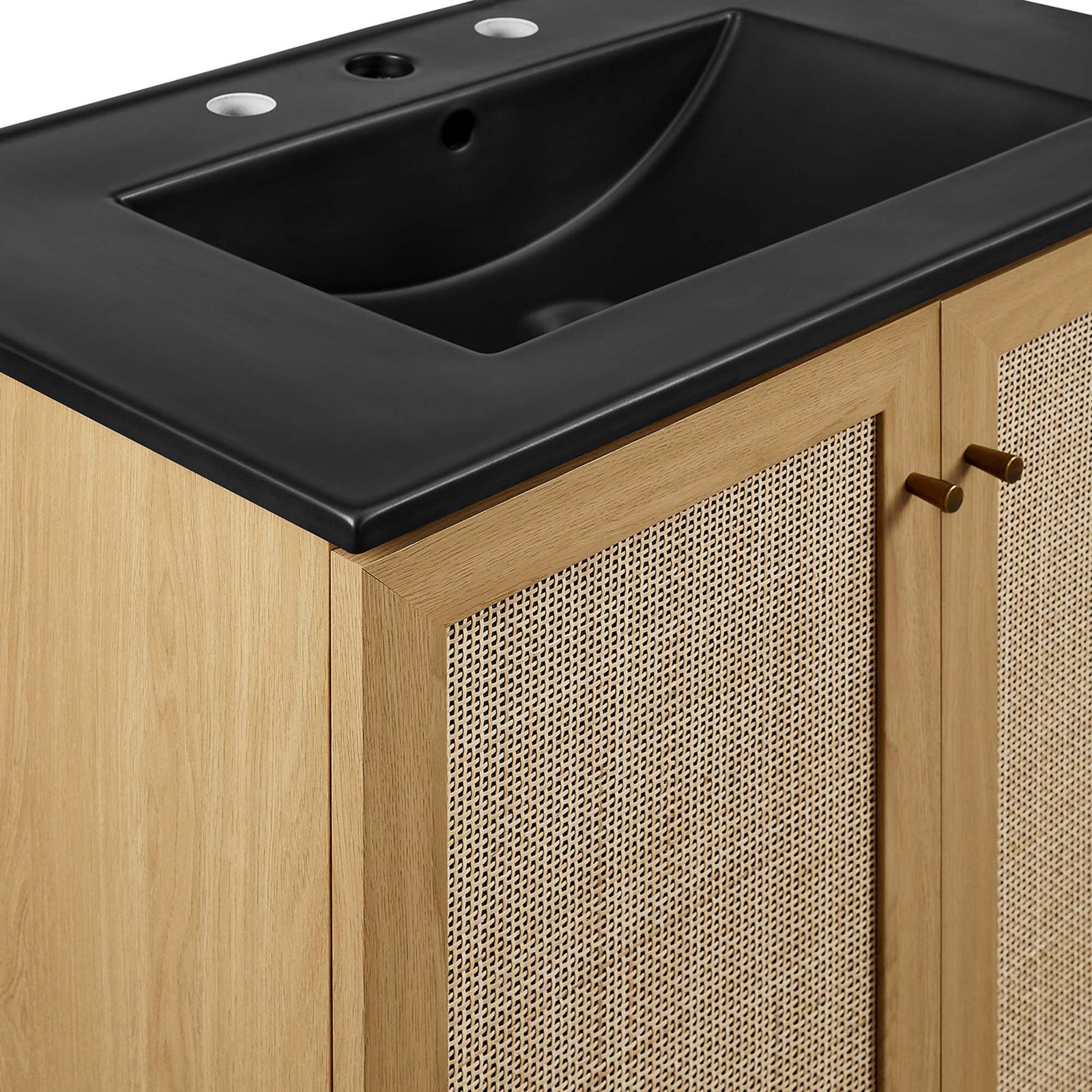 Brushed gold knobs and woven rattan doors elevate the oak cabinet with rich texture || EEI-6716-OAK-BLK || detail_studio