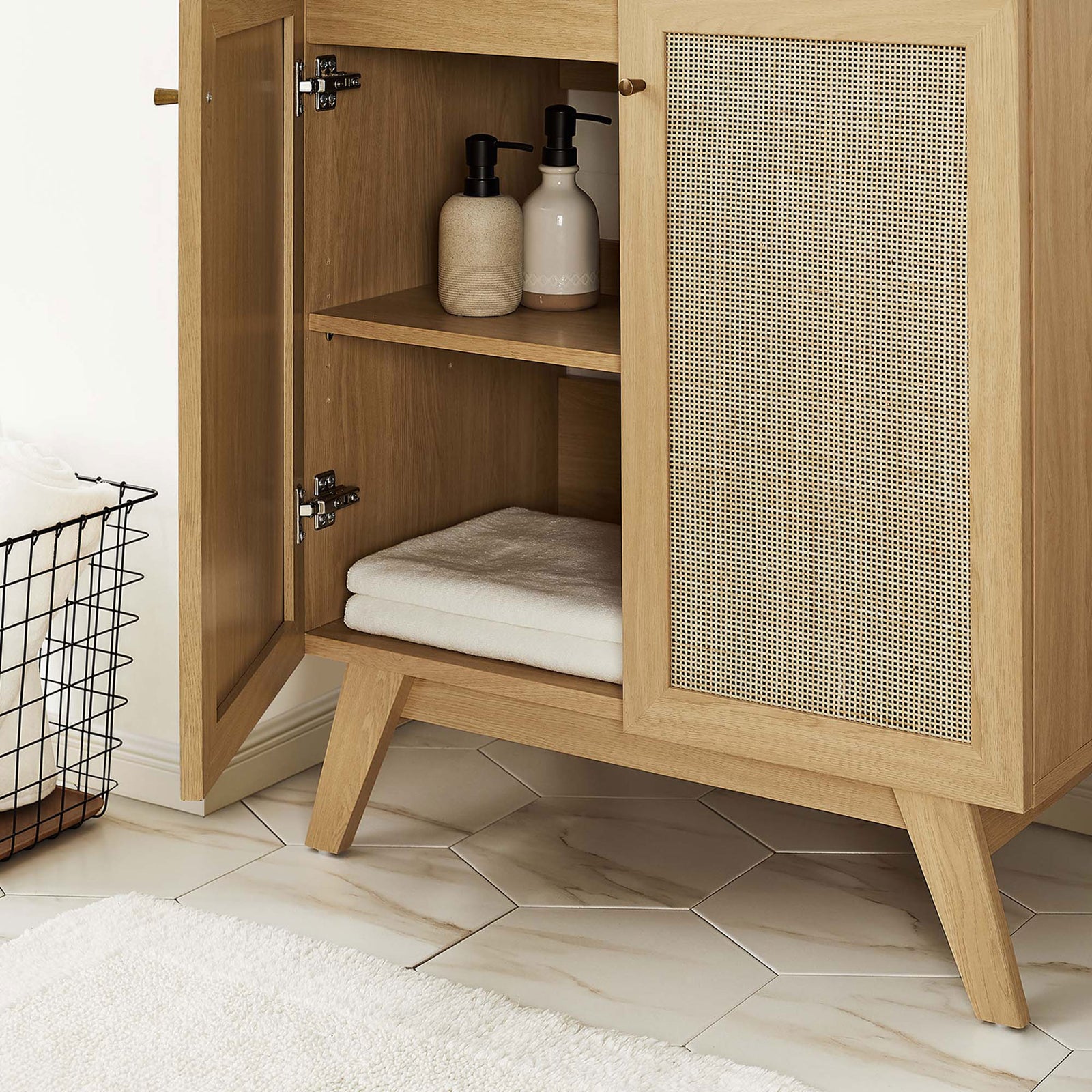 Spacious two-door storage with adjustable shelf keeps towels and essentials neatly organized || EEI-6716-OAK-BLK || storage_open_room