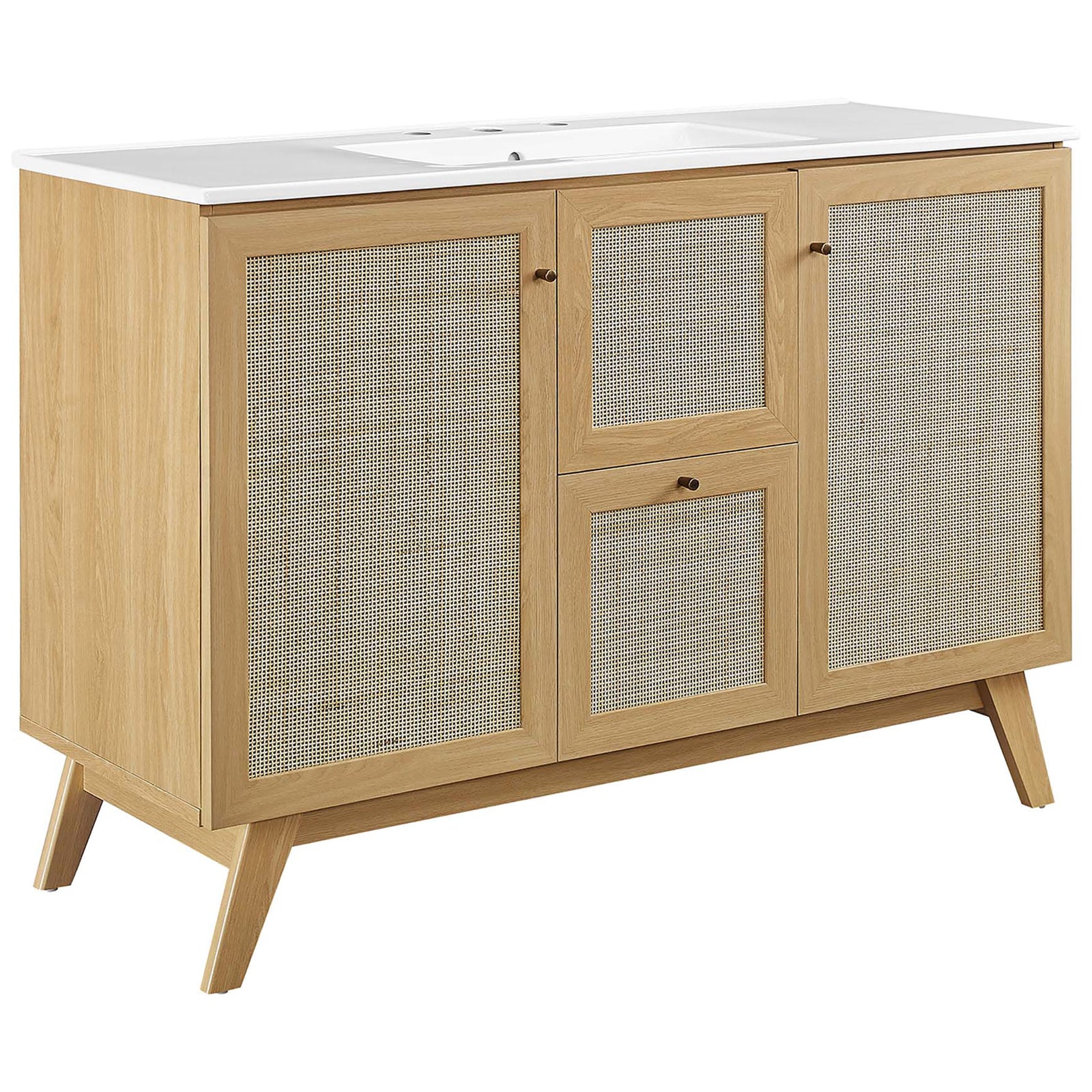 Warm oak vanity with rattan doors, brushed gold knobs, and a white ceramic sink || EEI-6719-OAK-WHI || front_angle_studio