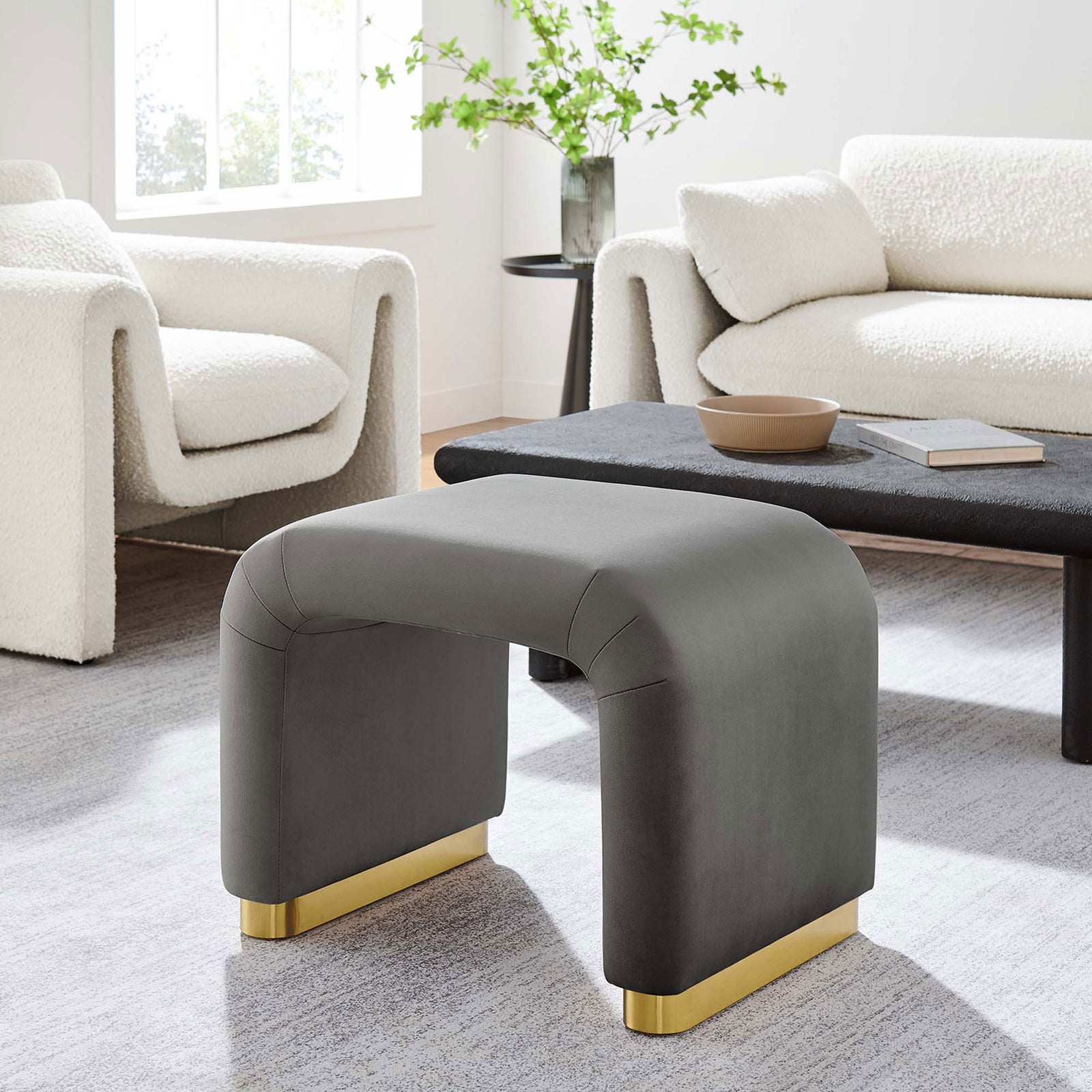 Versatile stool elevates a living room with storm gray velvet and polished brass accents || EEI-6733-BRA-STG || front_angle_room