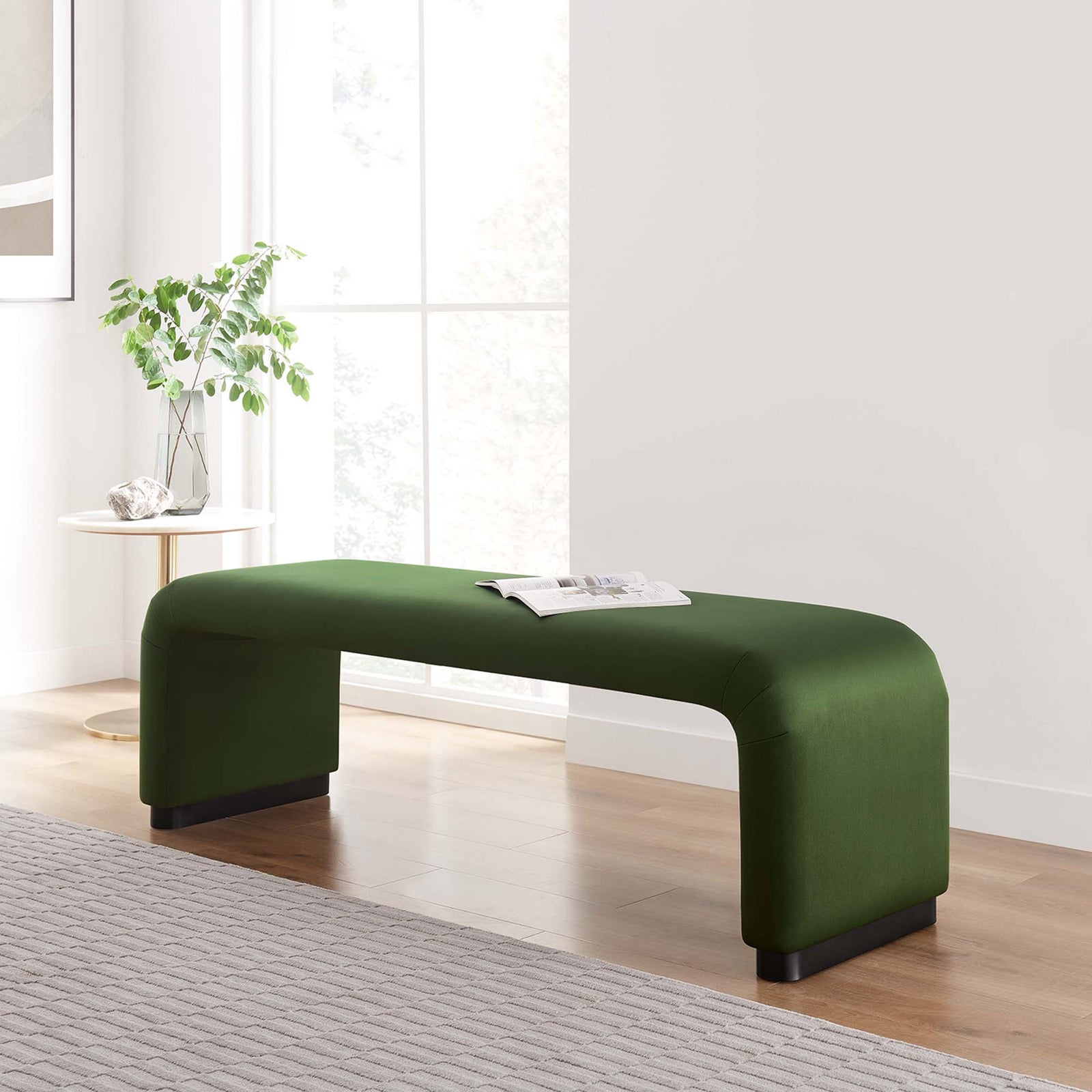 Showcases the modern silhouette and inviting moss green hue that elevates any contemporary space || EEI-6734-BLK-MOS || front_angle_room