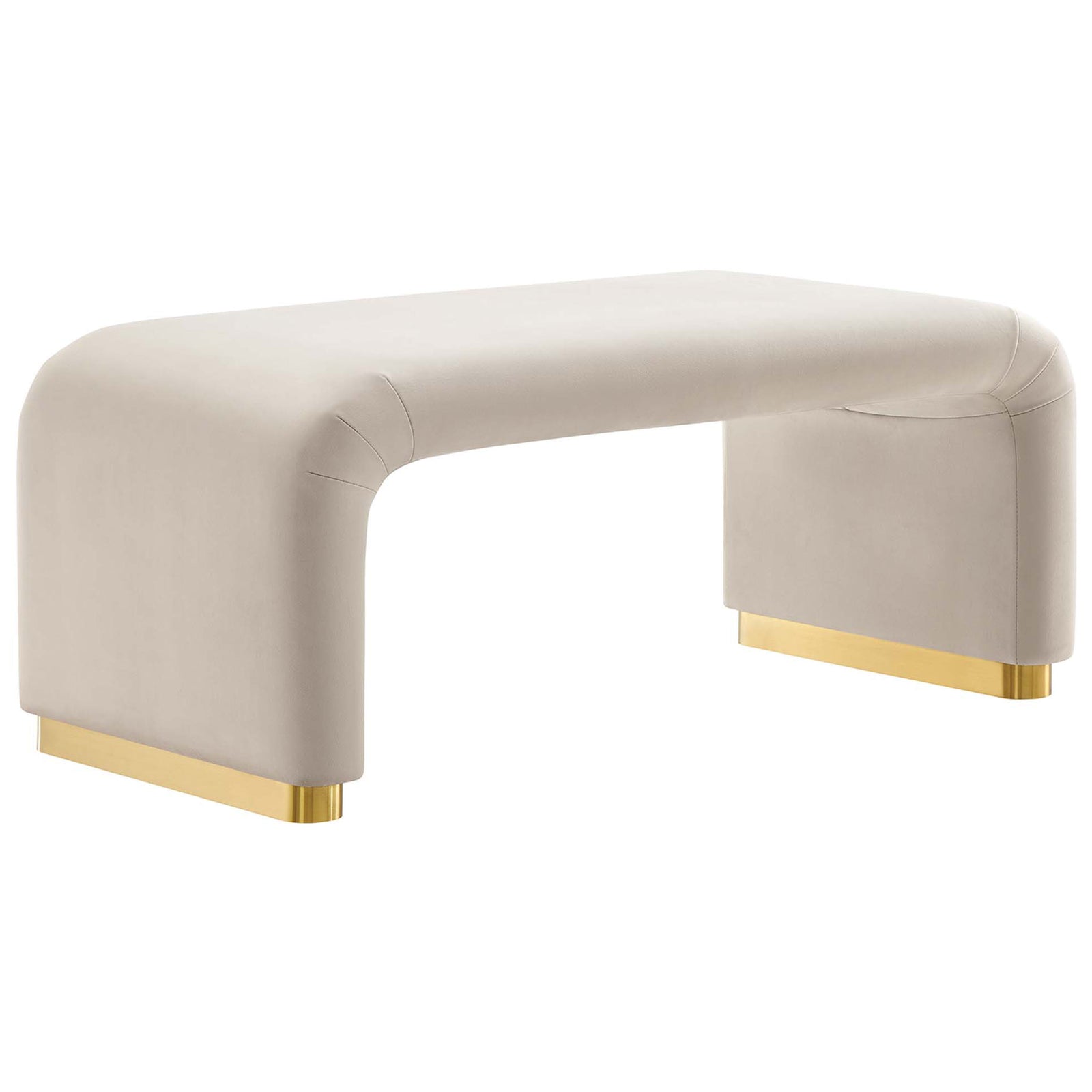 Curved Koda waterfall ottoman in almond performance velvet with gleaming brass base adds sculptural style || EEI-6735-BRA-ALM || front_angle_studio