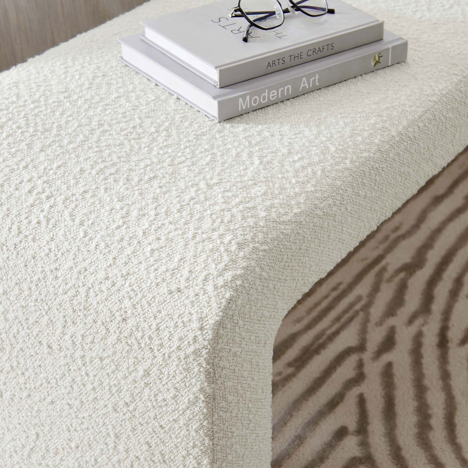 Ivory boucle bench styled with books, highlighting cozy texture in a serene bedroom || EEI-6736-IVO || detail_room
