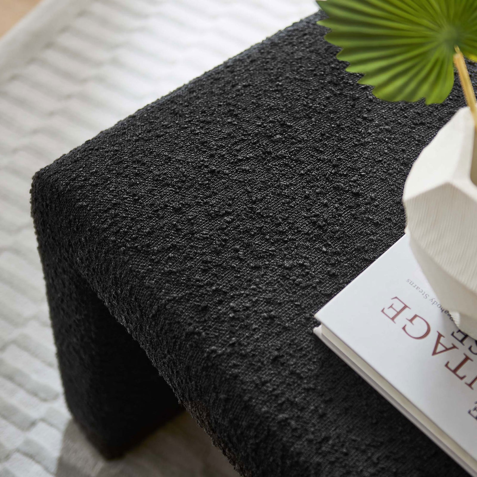 Richly textured black boucle surface elevates decor with a tactile, modern touch || EEI-6737-BLK || detail_room