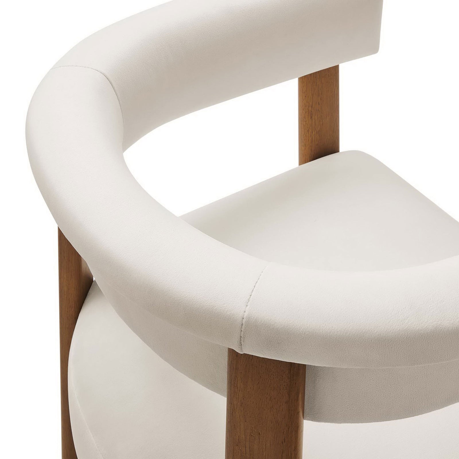 Curved barrel back and plush seat cushion highlight the smooth performance velvet upholstery. || EEI-6775-ALA-DBR || detail_studio