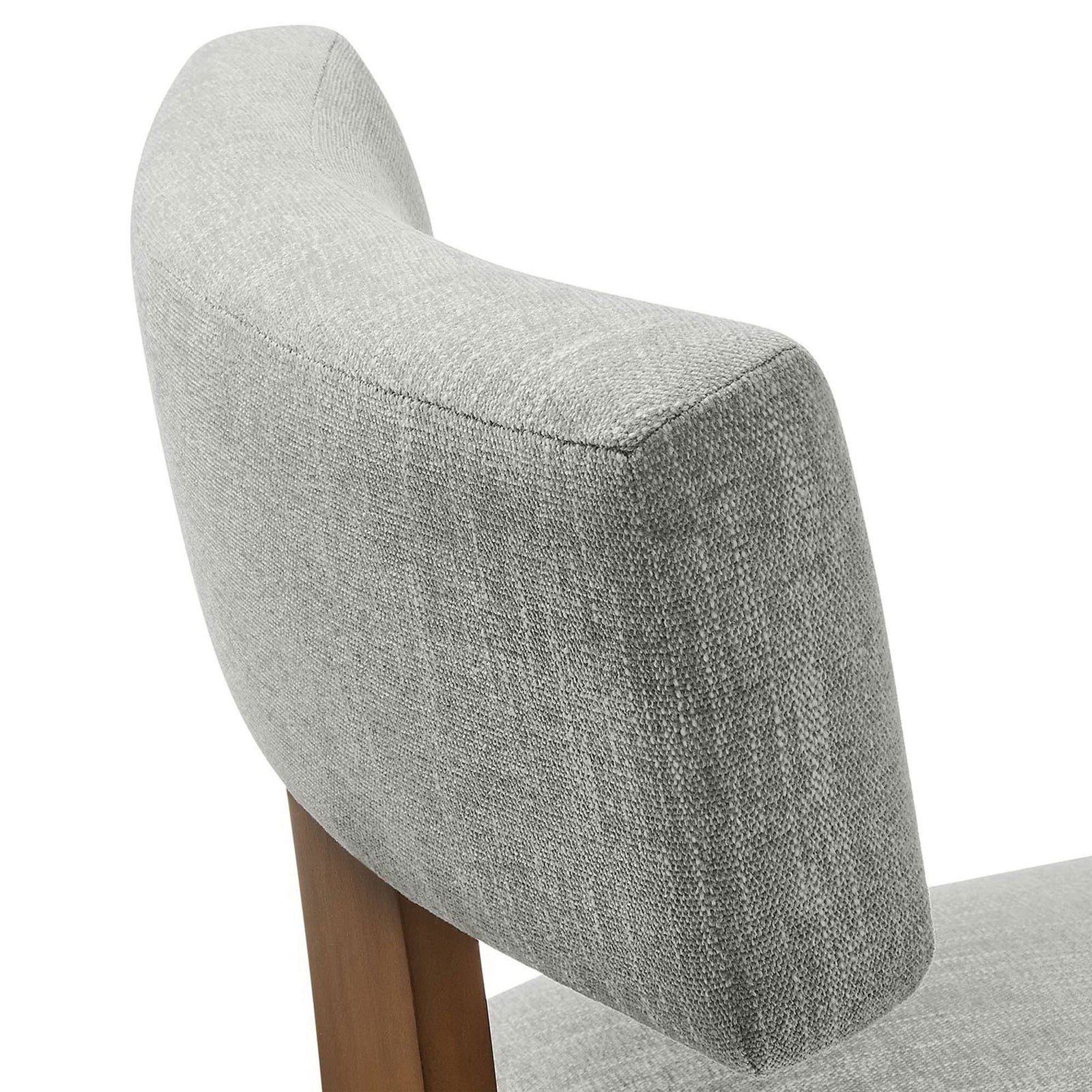 Curved heathered fabric backrest highlighting the plush upholstery texture and smooth edges. || EEI-6777-HEW-DBR || detail_studio