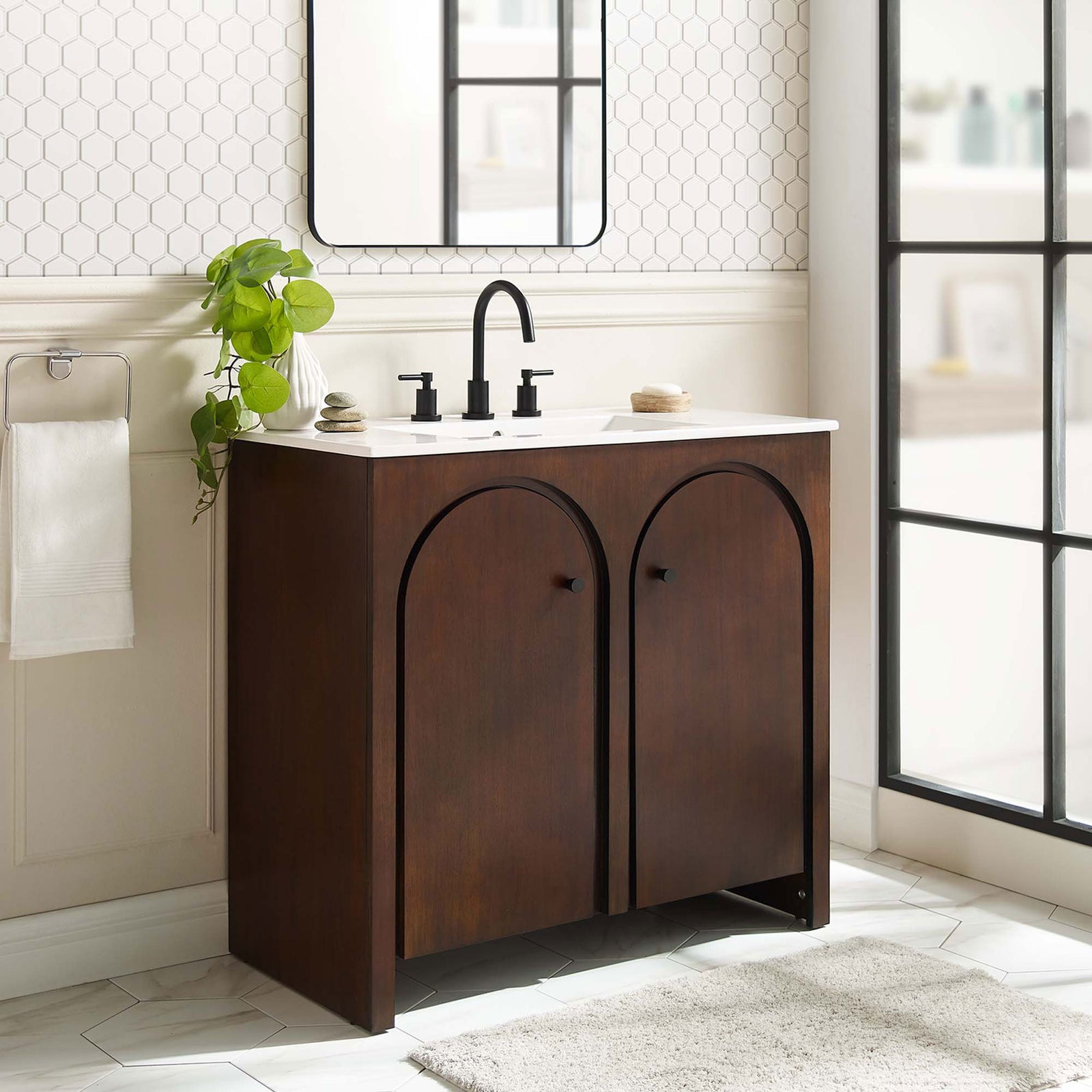 Walnut-and-white single vanity elevates the bath with warm wood tones and crisp modern contrast || EEI-6790-WAL-WHI || front_angle_room
