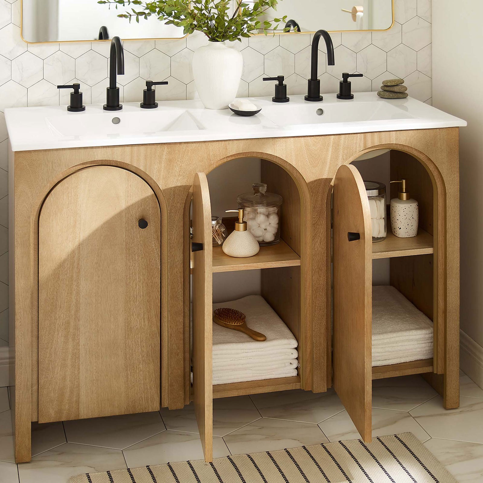 Ample storage behind arched doors with adjustable shelves beneath twin basins || EEI-6792-OAK-WHI || front_open_room