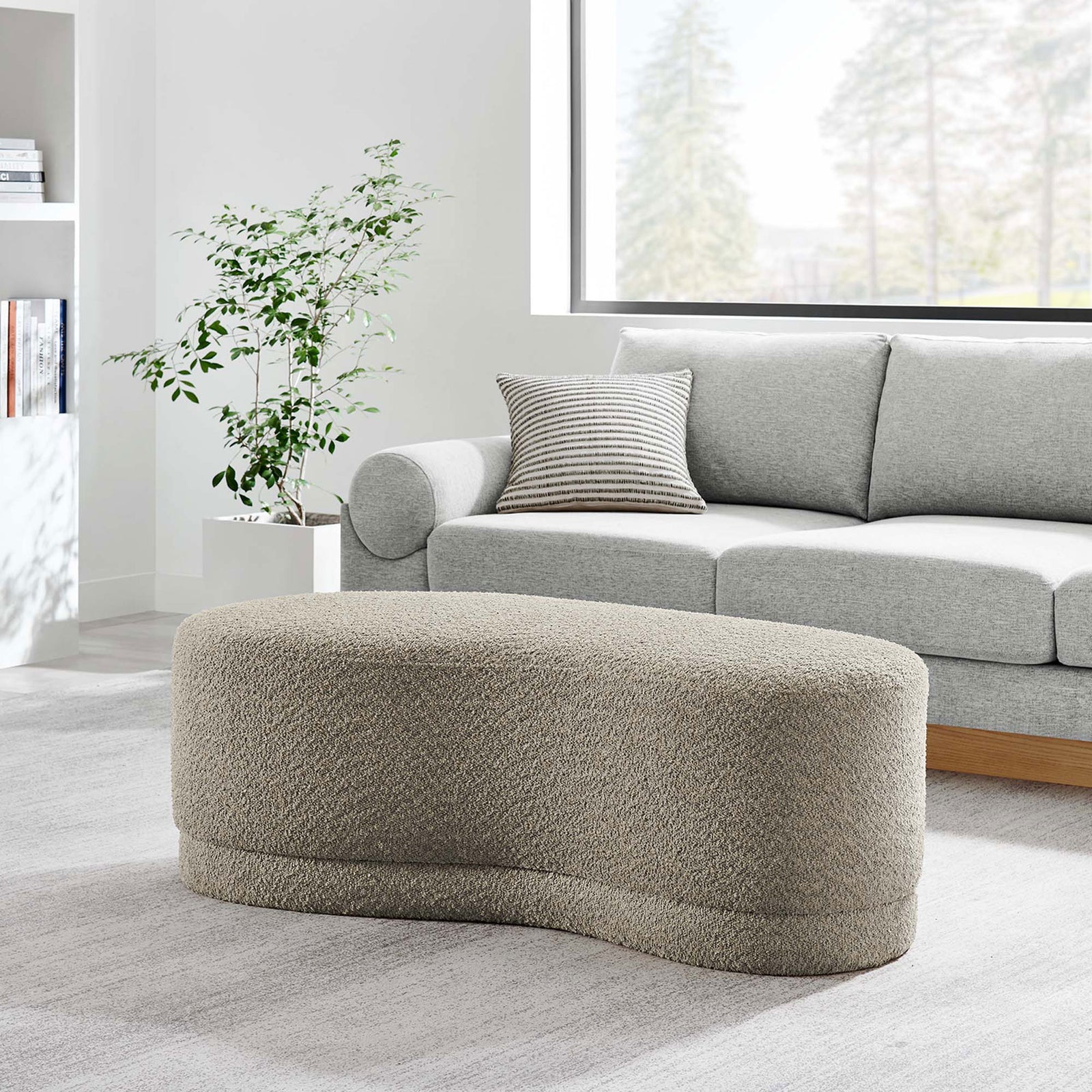 Nimbus oat chenille ottoman bench styled in a modern living room beside a streamlined gray sofa || EEI-6816-OAT || front_angle_room