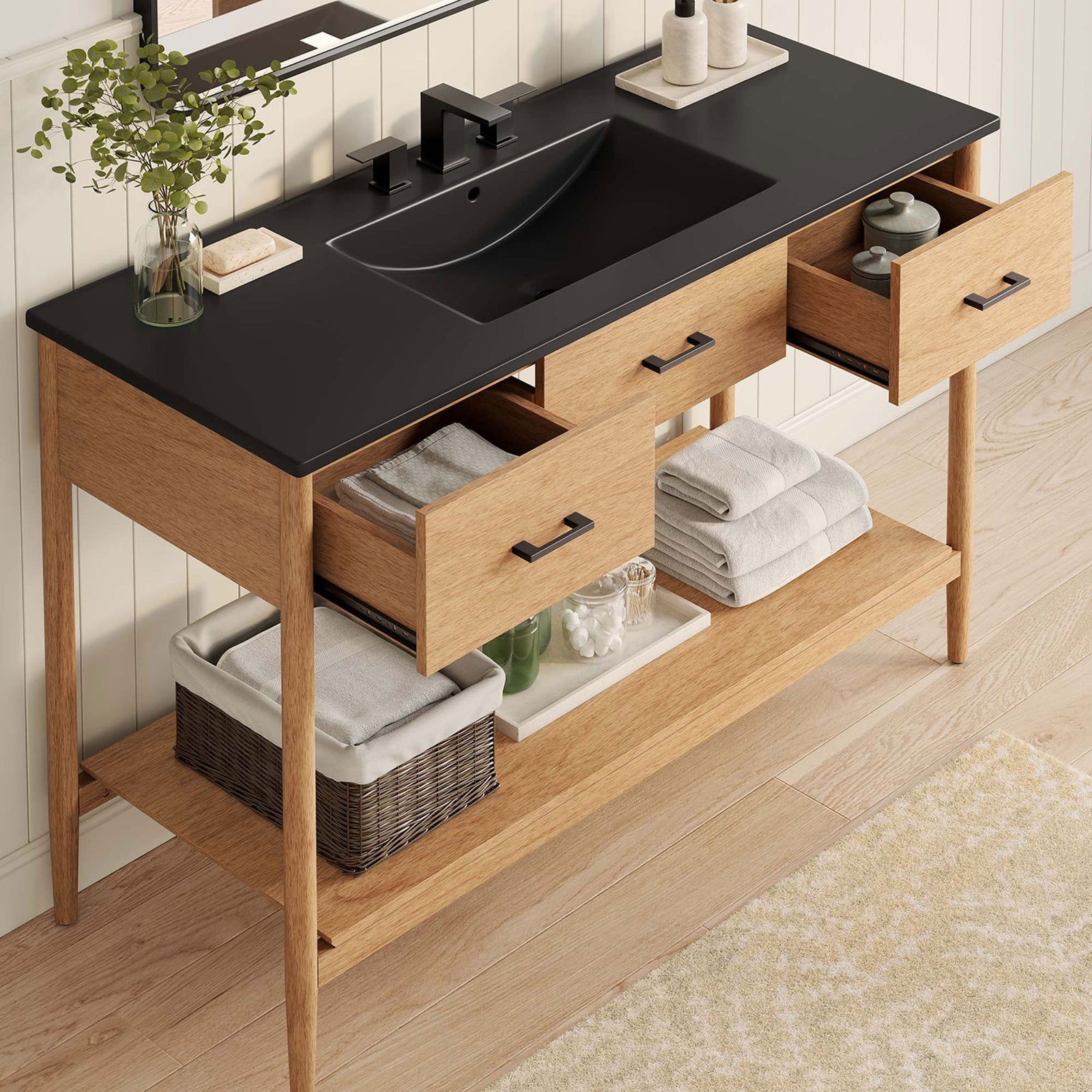 Practical storage with two drawers and open shelf, topped by a sleek black integrated sink || EEI-6825-NAT-BLK || front_angle_open_room