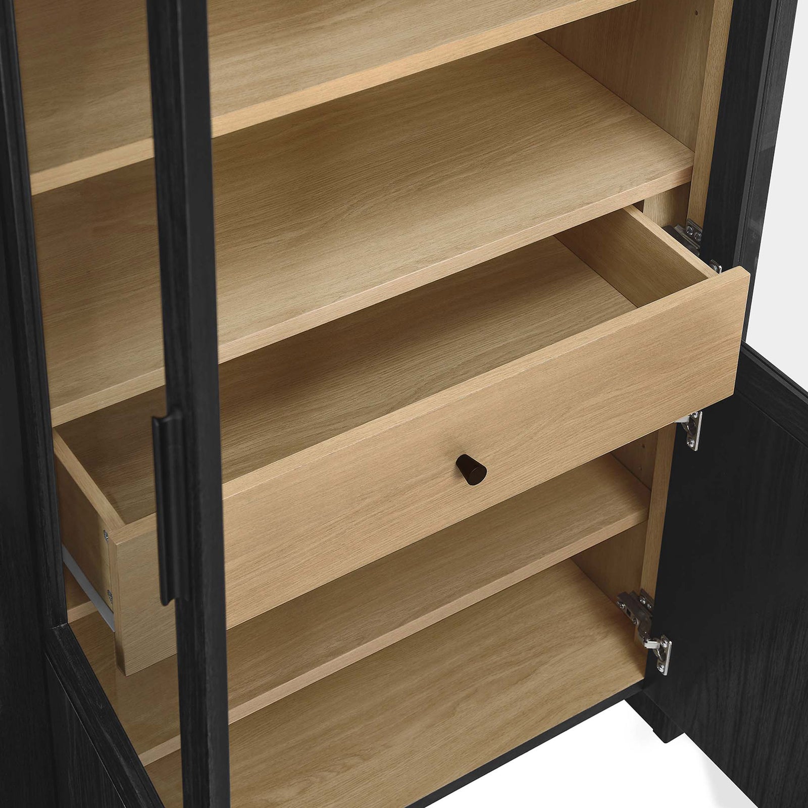 Close-up of the Evie cabinet interior with adjustable shelves and a smooth full-glide drawer || EEI-6834-BLK-OAK || storage_open_studio