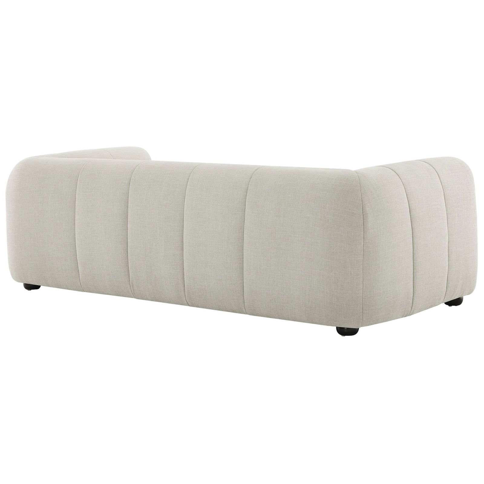 Tailored back cushions and vertical channeling wrap the linen sofa in soft, sculptural comfort || EEI-6866-LIN || back_angle_studio