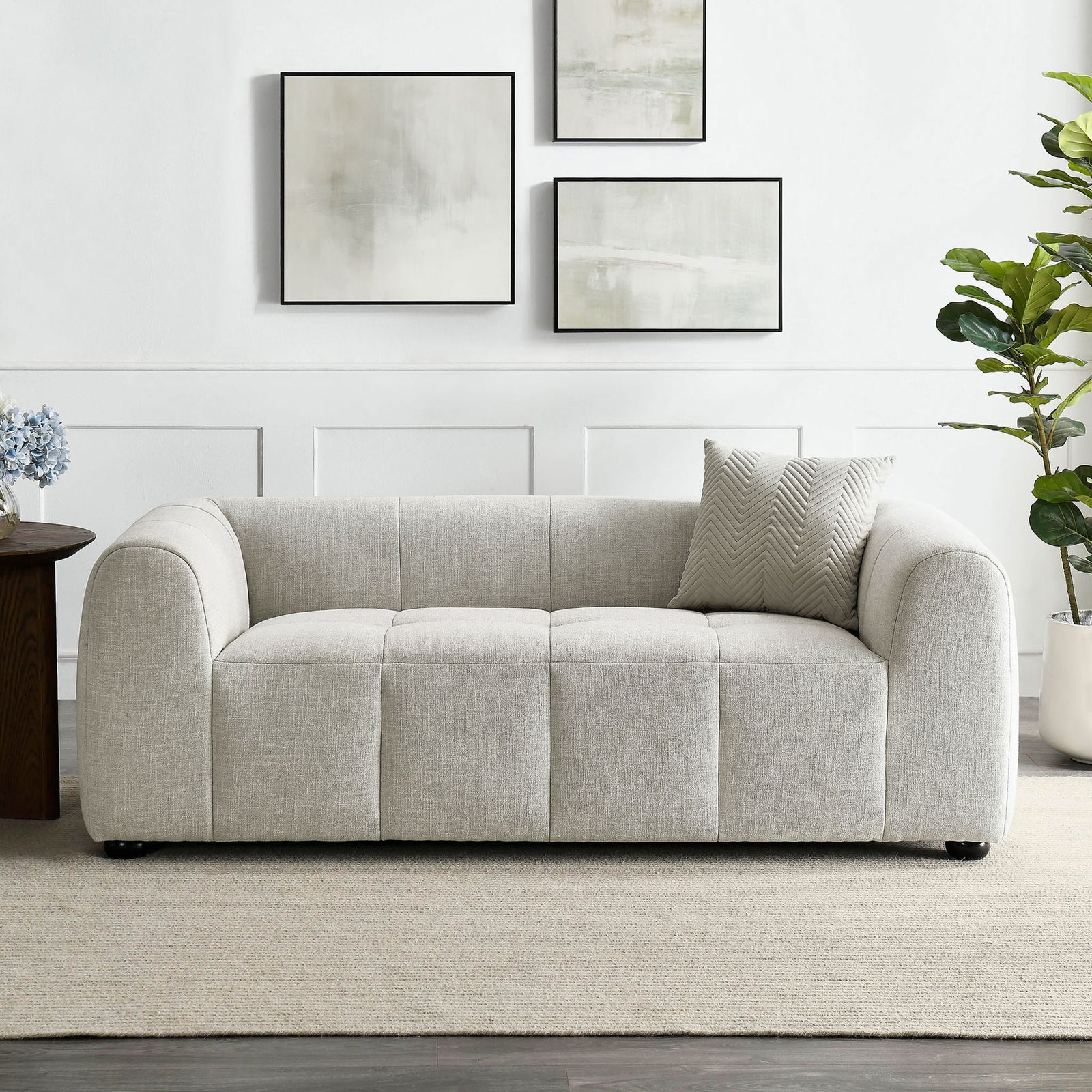 Linen loveseat styled in a modern living room with neutral decor and cozy deep seating || EEI-6867-LIN || front_room