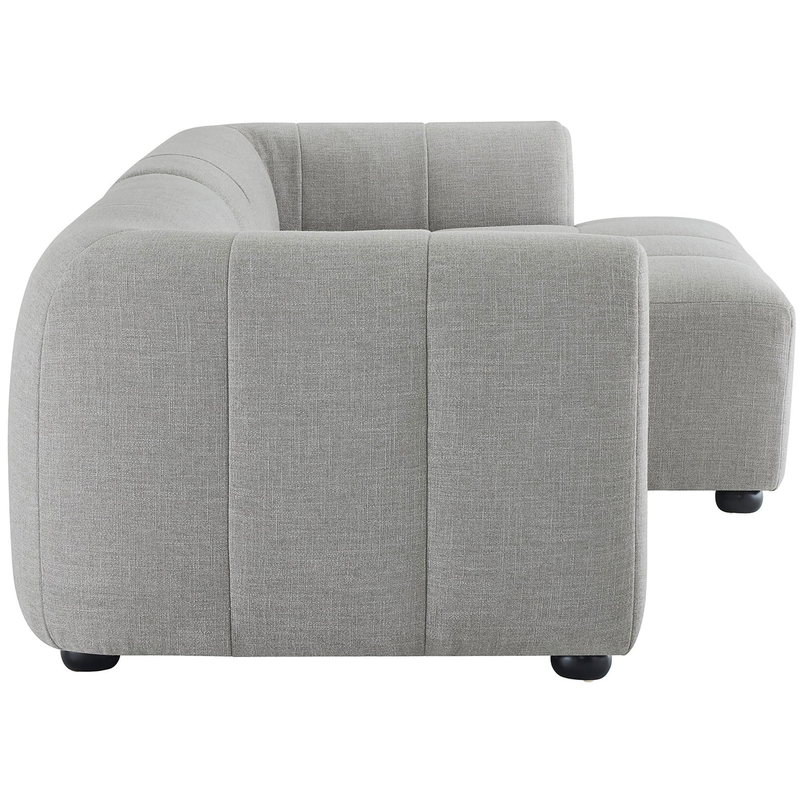 Side profile of the Liana right-facing sectional emphasizing the plush seat and rounded arm. || EEI-6869-PEW || side_studio