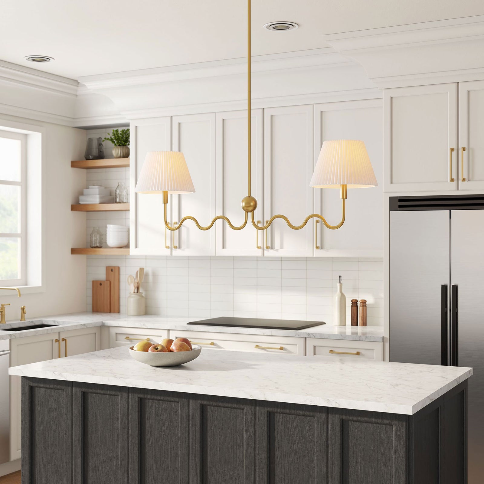 Pleated shades glow warmly above the island on a sculptural brass frame || EEI-6874-BRA || front_angle_on_room