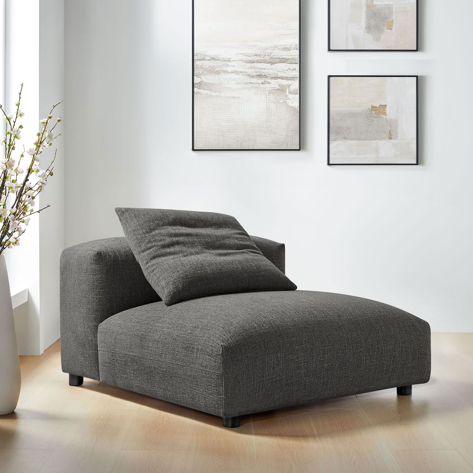 Charcoal armless lounge chair adds relaxed modern style with plush cushioning and a matching pillow || EEI-6885-CHA || front_angle_room