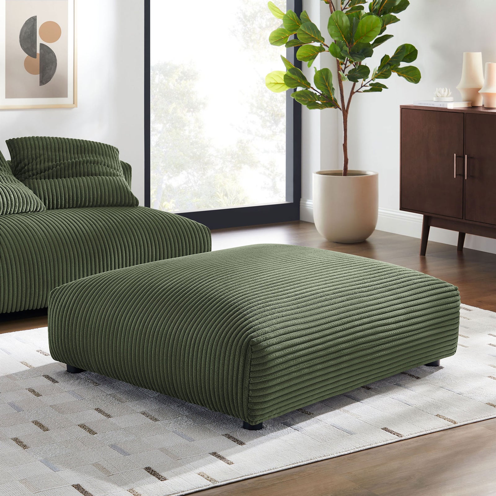 Fern corduroy modular ottoman anchoring a cozy living room with matching seating and warm wood accents. || EEI-6888-FRN || front_angle_room