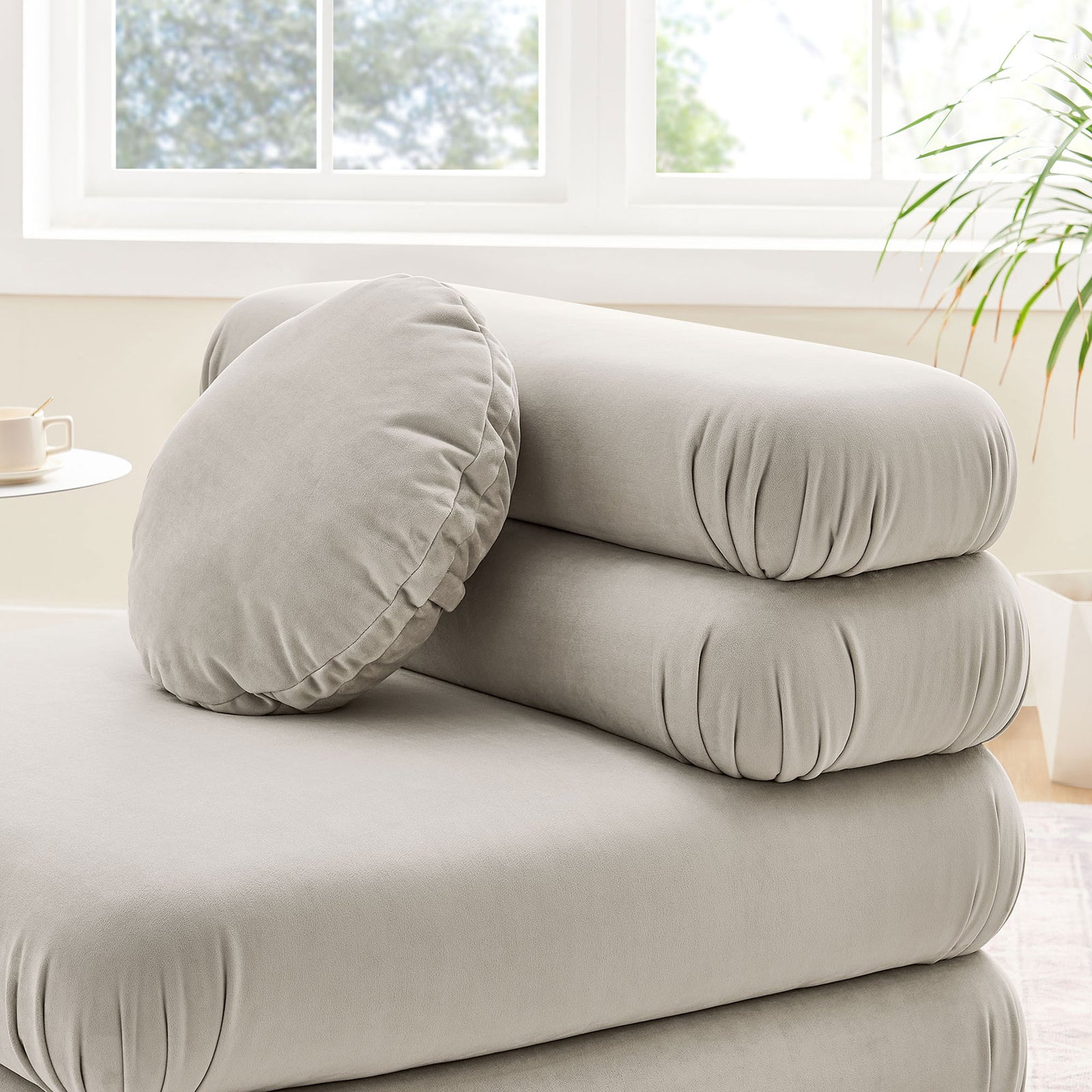 Velvety upholstery and stacked cushion layers offer tactile softness and support || EEI-6896-ALM || detail_room