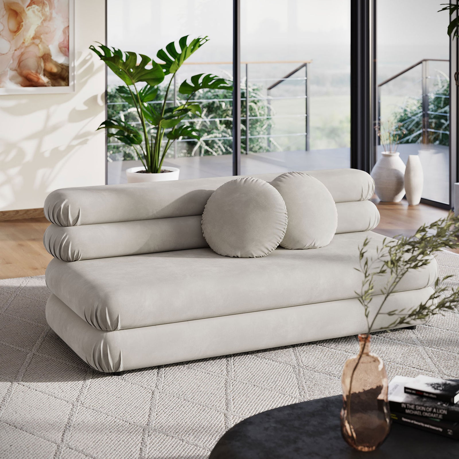 Jubilee almond velvet loveseat creating a plush focal point in a contemporary living space with greenery accents || EEI-6897-ALM || front_angle_room