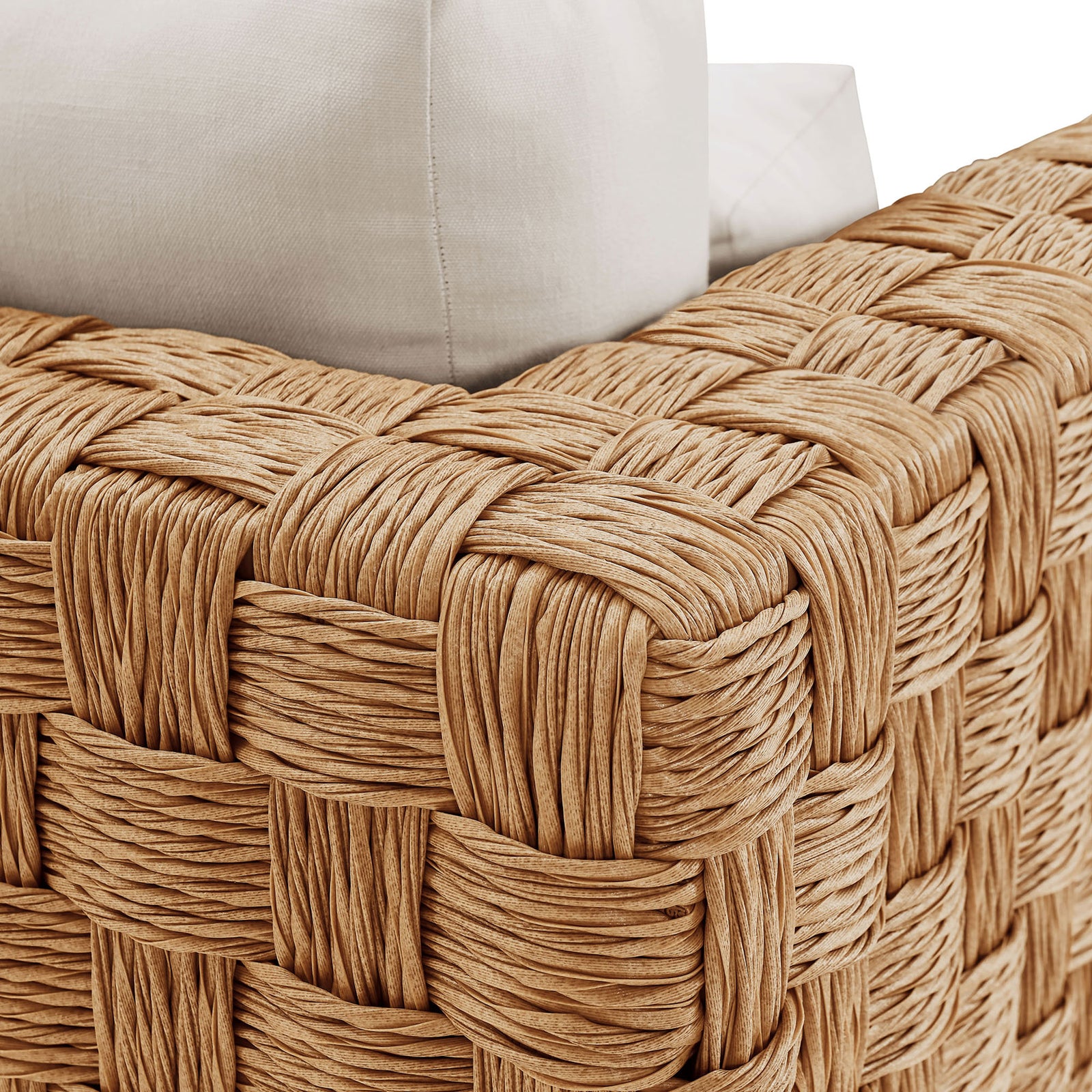 Textured basket-woven natural rattan wrapping the arm of the Thames outdoor armchair || EEI-6925-NAT-LGR || swatch_studio